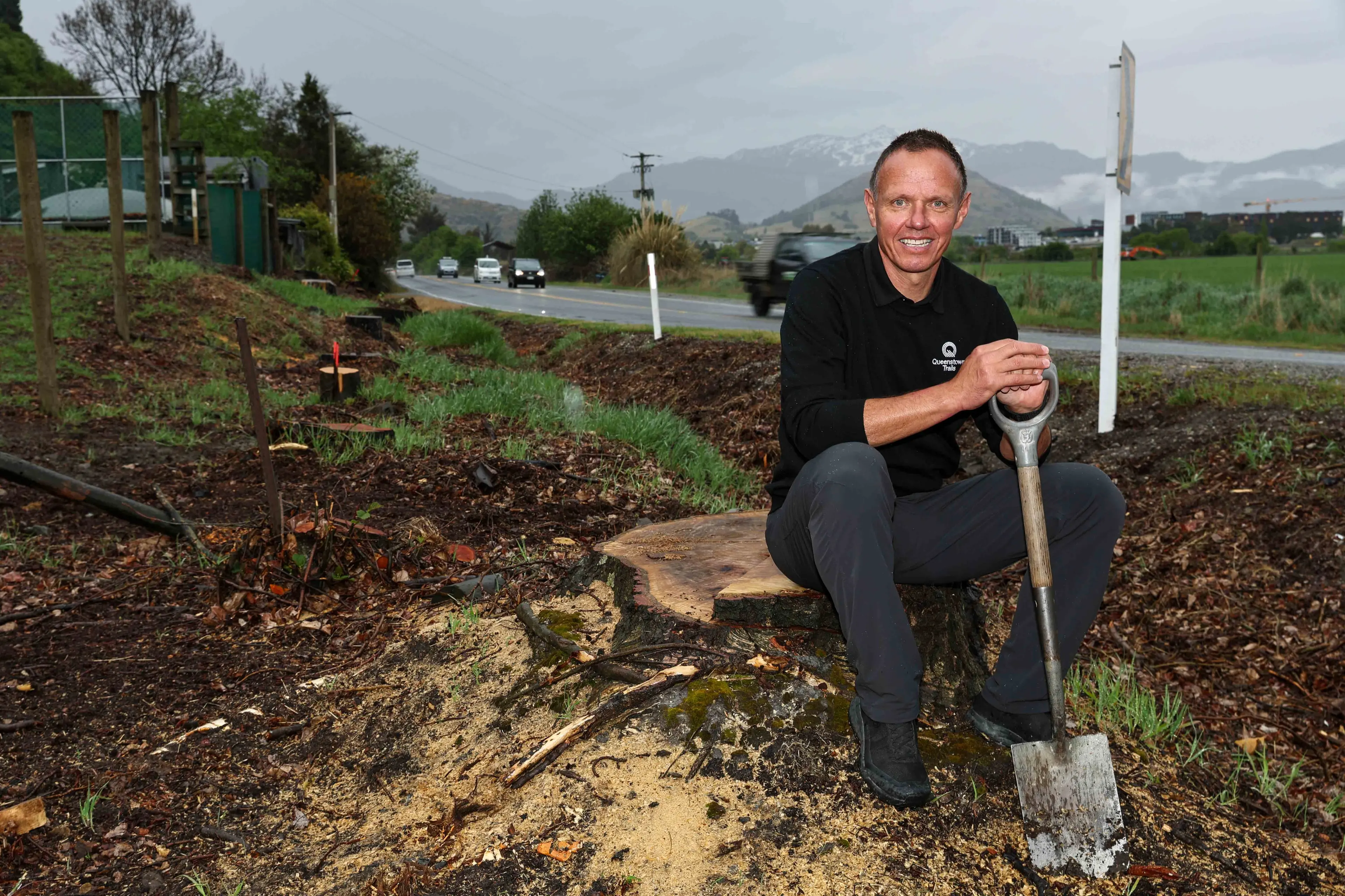 All go: Queenstown Trails Trust CEO Mark \\u2018Willy\\u2019 Williams by a landmark\\u00A0stone cottage which the soon-to-built southern corridor will pass by. Photo: James Allan Photography