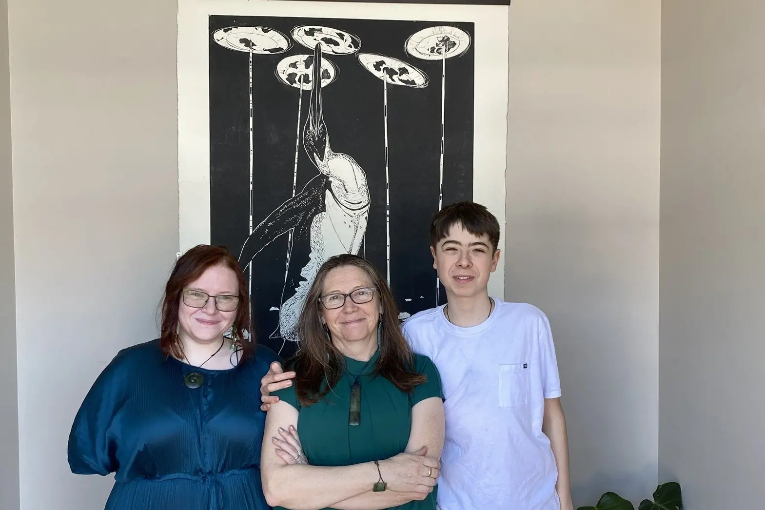 The opening of the McNaughton Performing Arts Studio on Sunday was a chance for the Dunedin arts community to celebrate with its creators. Pictured in the foyer of the new studio, flanked by a Manu Berry art work, are studio creator Cindy Diver (centre) and her children Mackenzie Diver (left) and Harrison Diver. Photo: Brenda Harwood