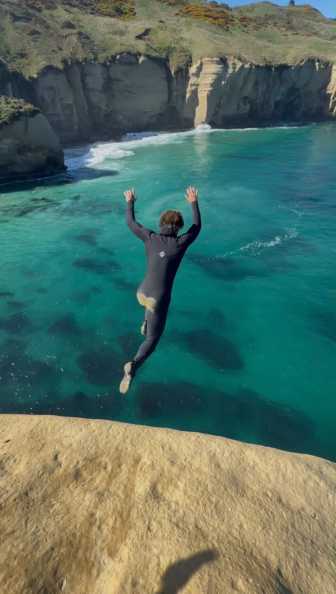 Adrenaline junkie’s Tunnel Beach jump leads to ‘intervention’ from mum