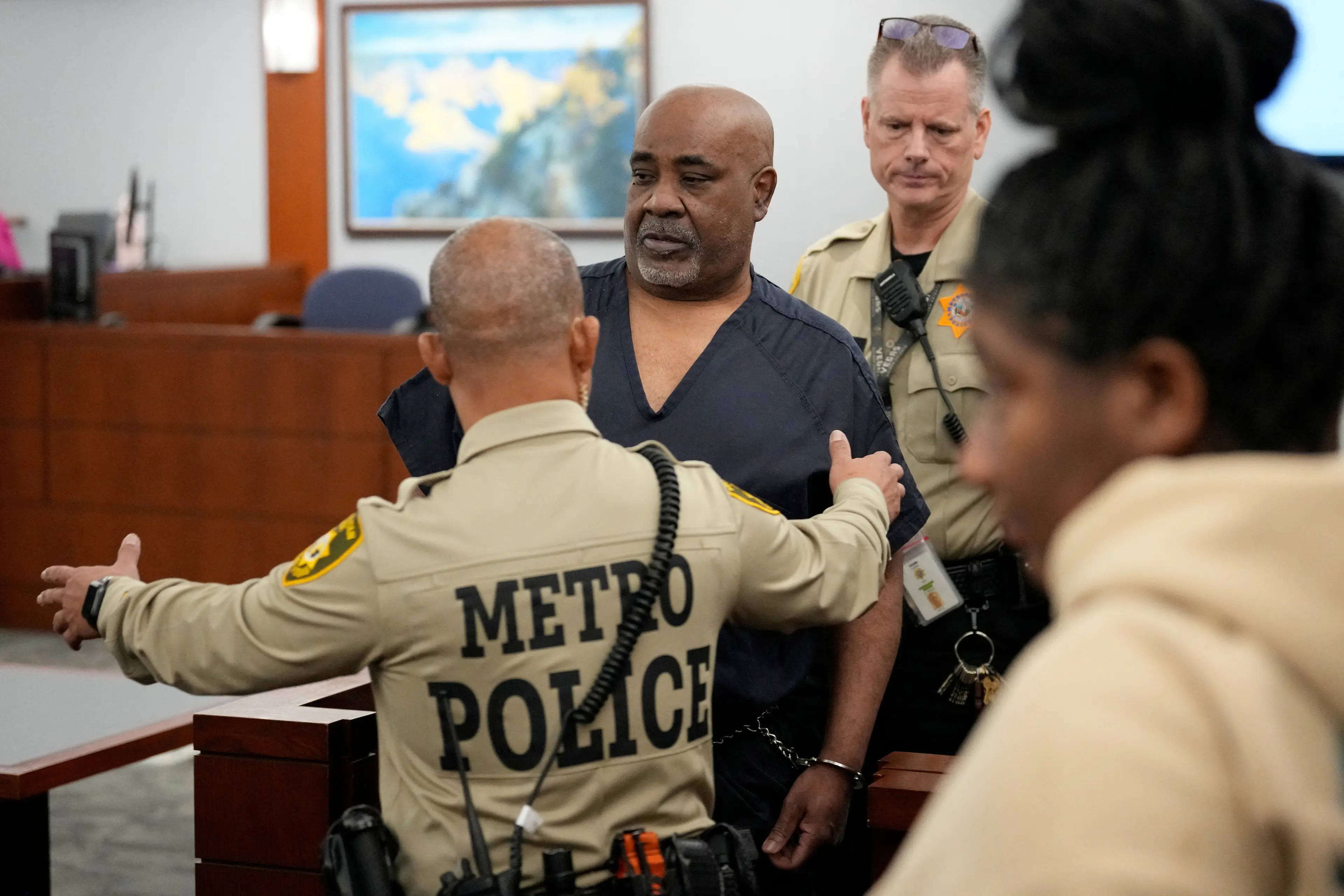 Duane Davis is escorted by police from a Las Vegas court after sentencing. Photo: Reuters