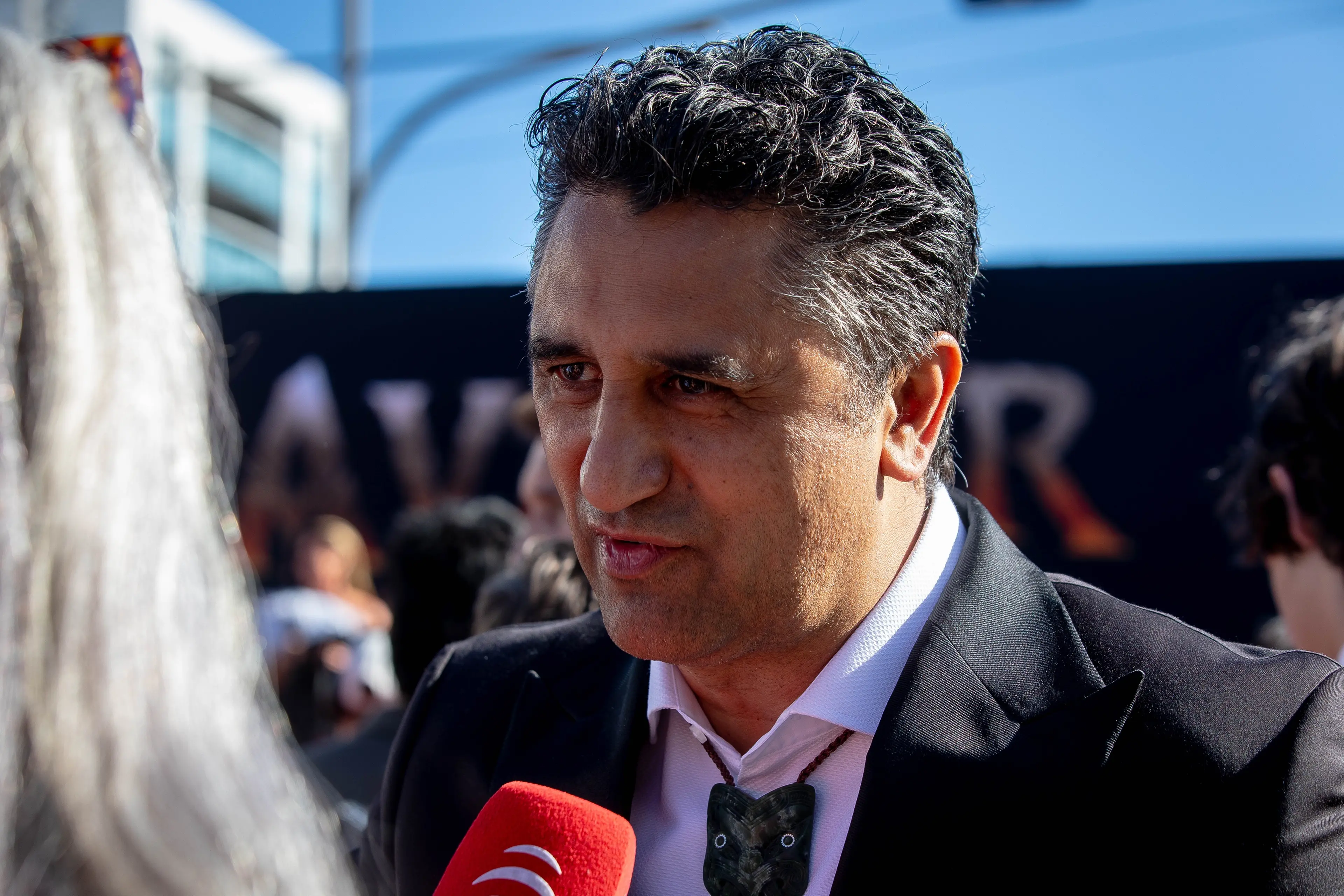 New Zealand actor Cliff Curtis speaks to media on the red carpet at the premiere of Avatar: Fire and Ash in Wellington on 13 December, 2025.