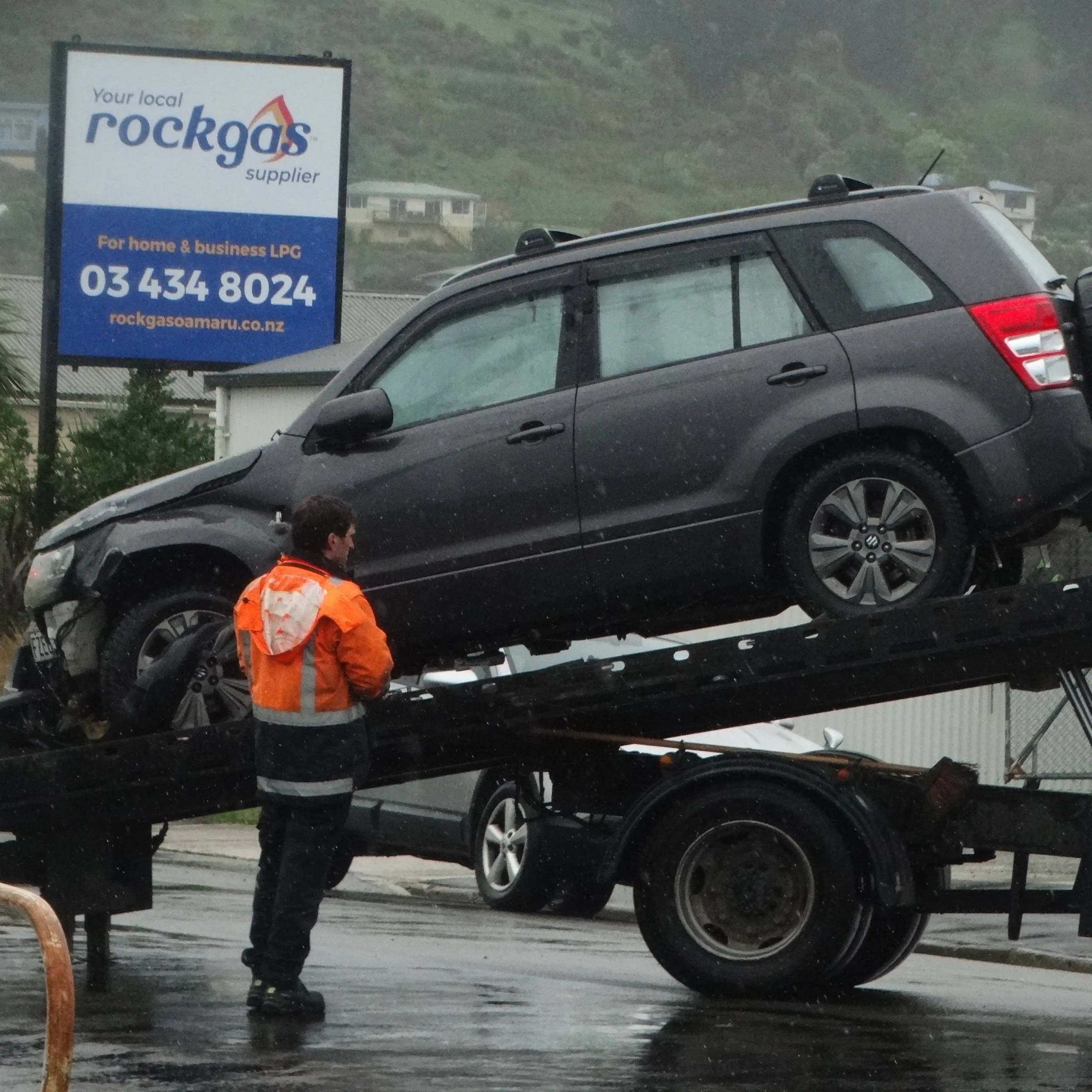 Car rolls, crashes into gate of Oamaru business