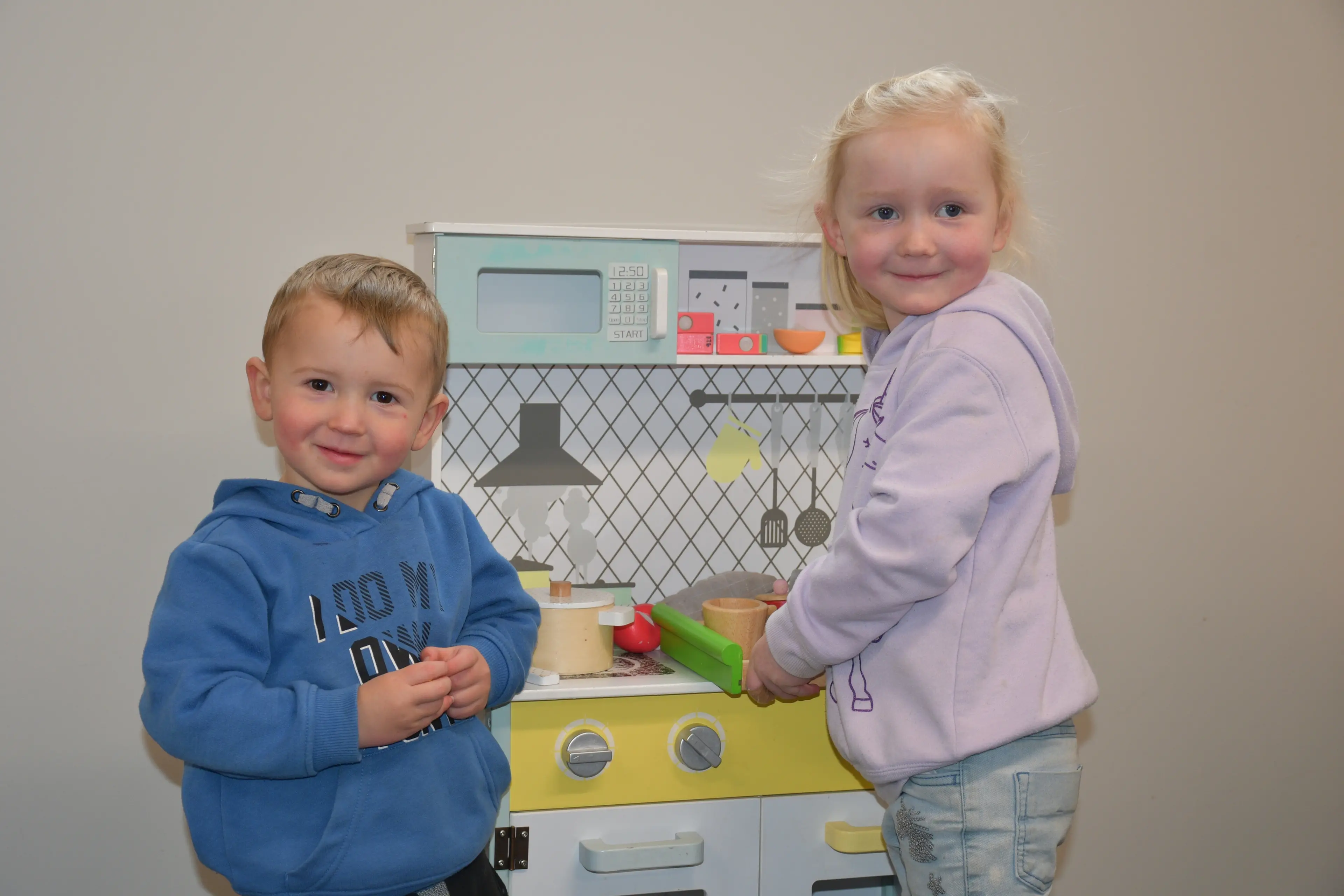 Wyot, 2, and Octavia, 4, Anderson, of Gore, enjoy one of the close to 1000 toys the Gore Toy Library offers. The group is hoping to replace its older toys with funds from its online silent auction, running from October 17 to November 1. Photo: Gemma Sinclair
