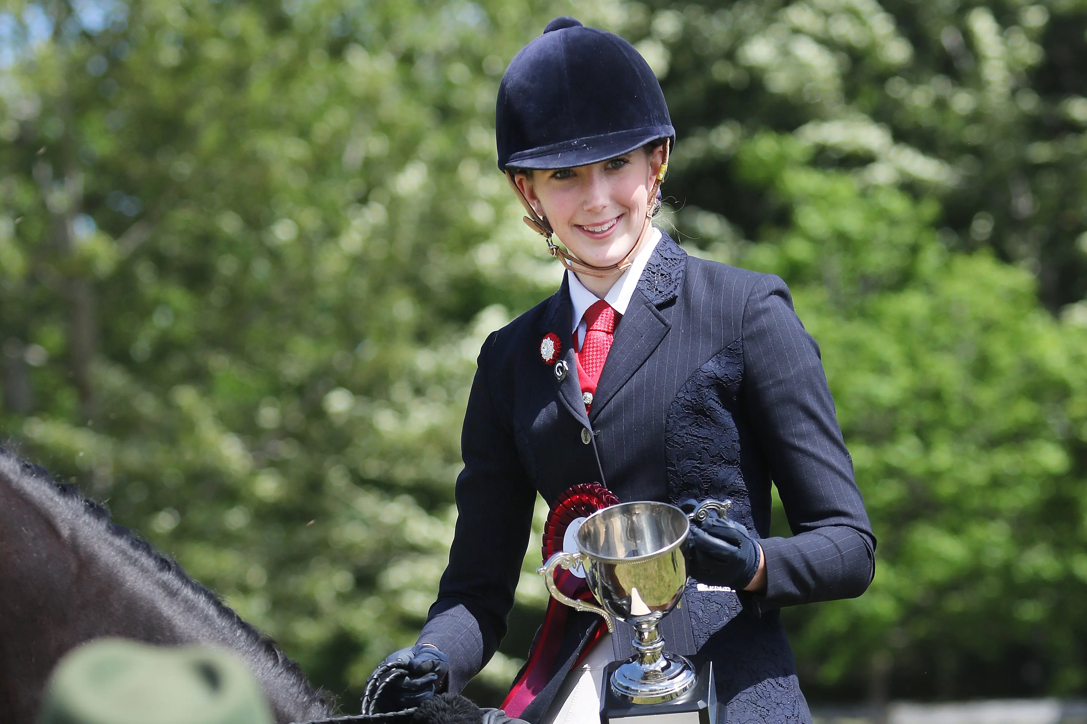 Celebrations . . . Sammy Donovan (16), of Fernside, was all smiles after winning the Lorella Jackson Memorial Cup for showing ponies at the Amberley A&P Show last year. Photo: File
