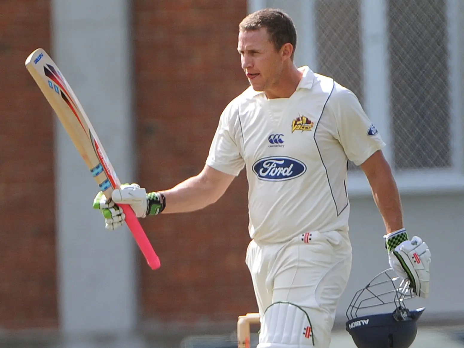 Craig Cumming celebrates yet another century for Otago. Photo: Peter McIntosh