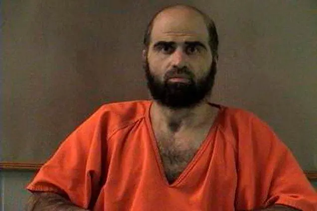 Nidal Hasan, charged with killing 13 people and wounding 31 in a November 2009 shooting spree at Fort Hood, is pictured in an undated handout photo. Photo: Reuters