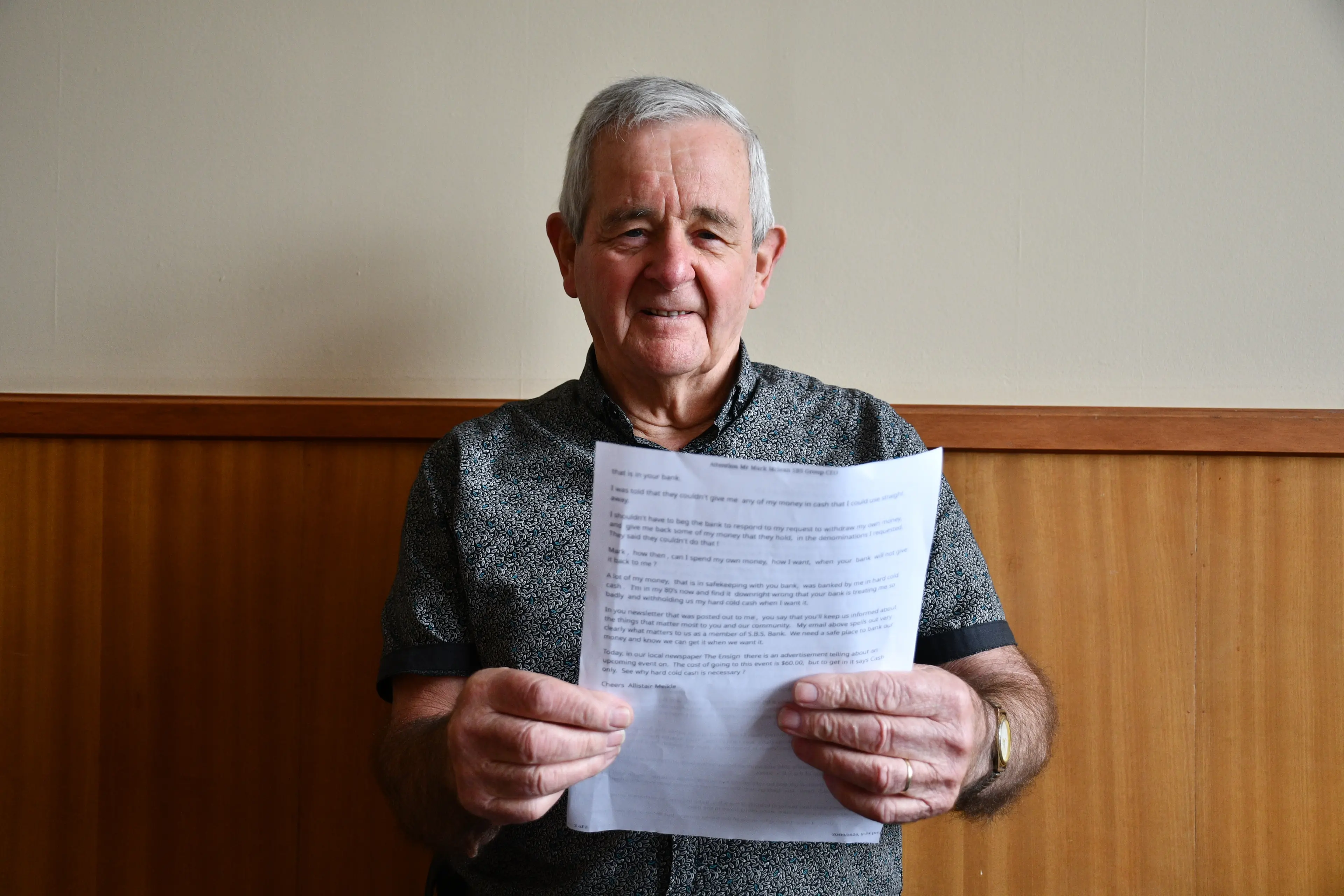 East Gore pensioner Allistair Meikle holds a copy of an email he sent to SBS Bank Group chief executive Mark McLean in September, to which he got a response on Friday. Photo: Gemma Sinclair
