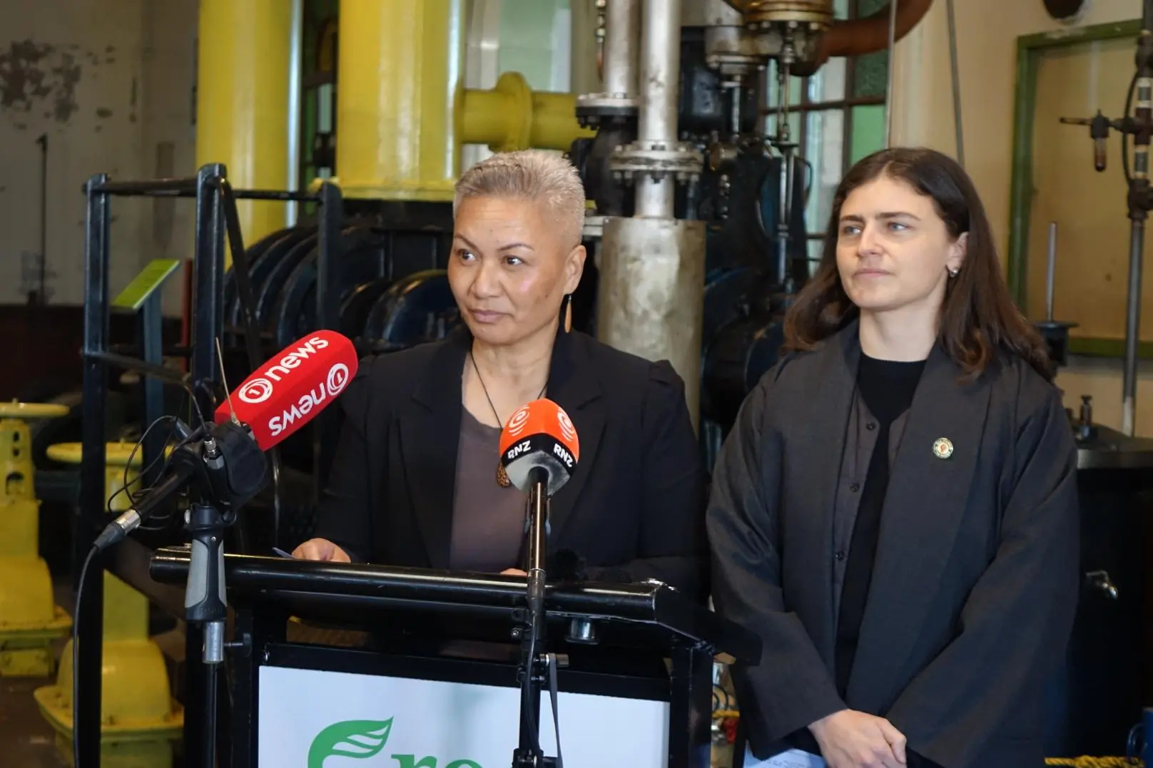 Green Party co-leaders Marama Davidson and Chl\\u00F6e Swarbrick speak to media. Photo: RNZ / Nosiphi Mapukata