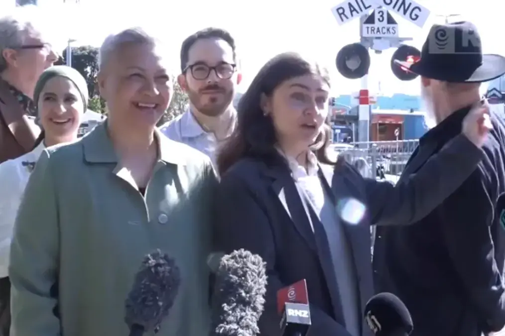 Green Party co-leaders Marama Davidson and Chl\\u00F6e Swarbrick (centre) were at the lines crossing when the incident happened. Image: screengrab via RNZ
