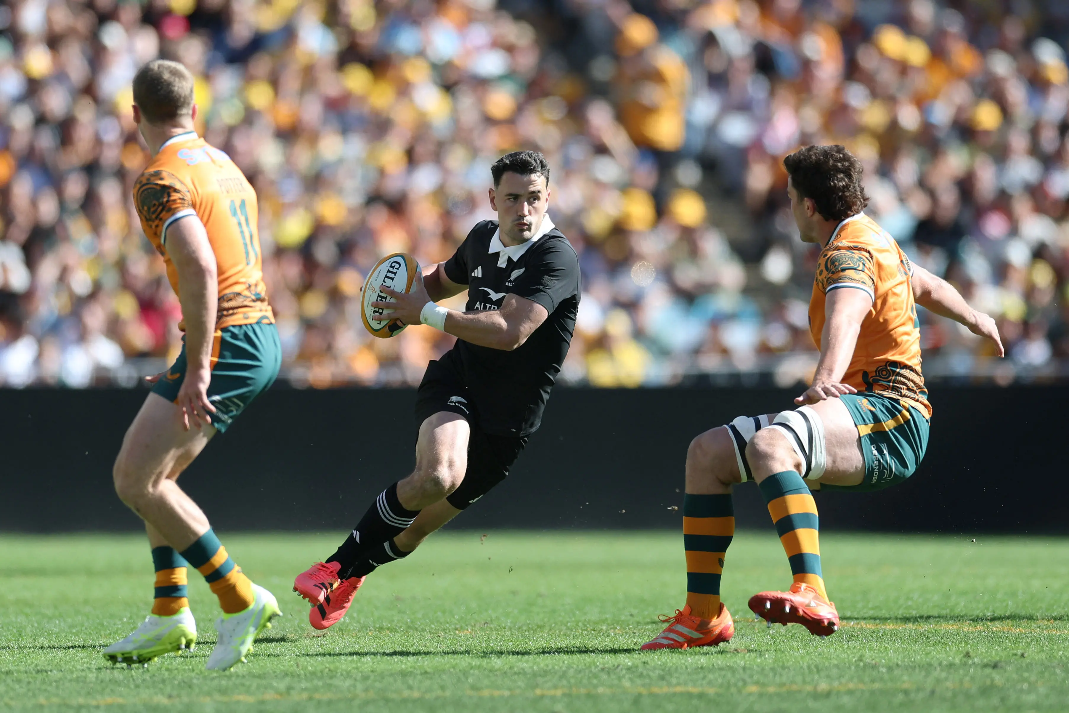 Will Jordan runs the ball up for the All Blacks against the Wallabies. Photo: Reuters