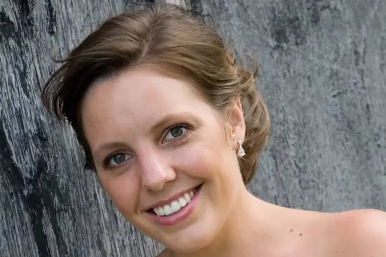 Alecia Sanderson pictured as a bridesmaid at her sister\\'s wedding. The 32-year-old died in October 2021, two months after giving birth. She was due to be married on the lawn at her mother\\'s home. Photo: Keryn Maunder