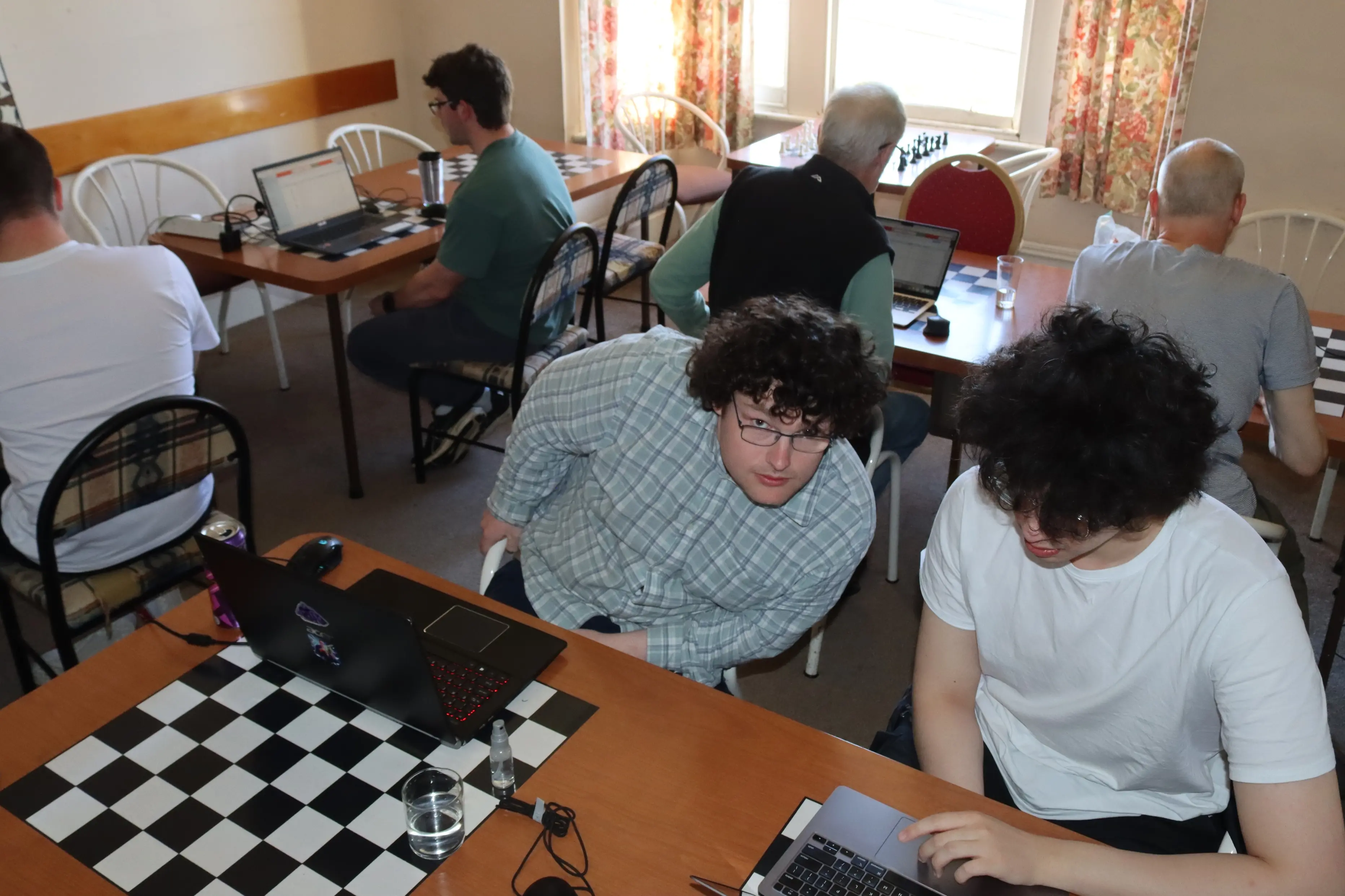 Preparing to play online are Otago Chess Club members Rogan-Joe Sloan (left) and Romero Suggate. Photo: Sam Henderson