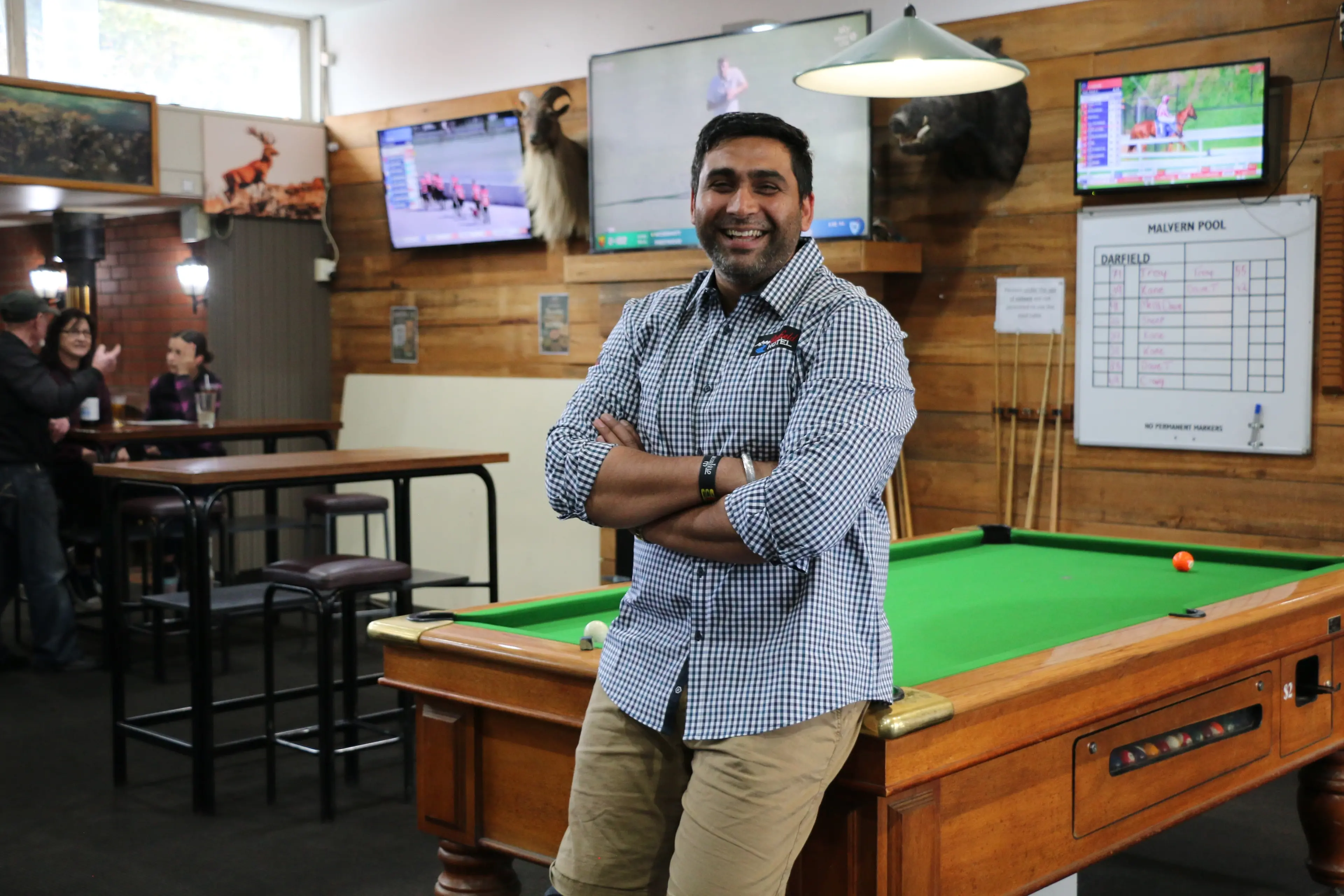 Darfield Hotel owner Pravesh Kumar inside his country pub. Photo: RNZ/Anisha Satya