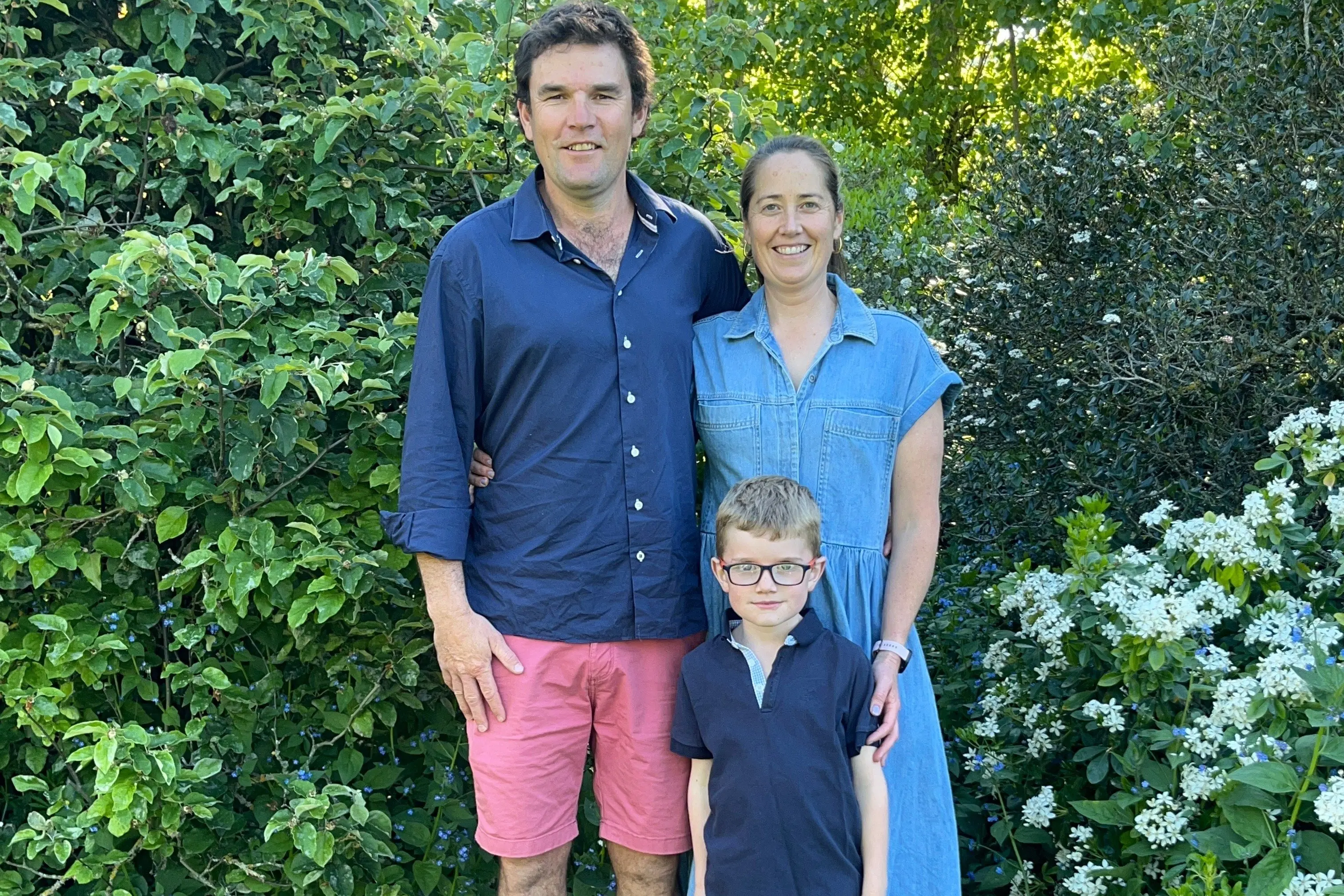 Family affair . . . James Gardiner (left) will serve as president for the 125th Amberley A&P Show, with support from his partner Libby and son Jack (5). Photo: Supplied
