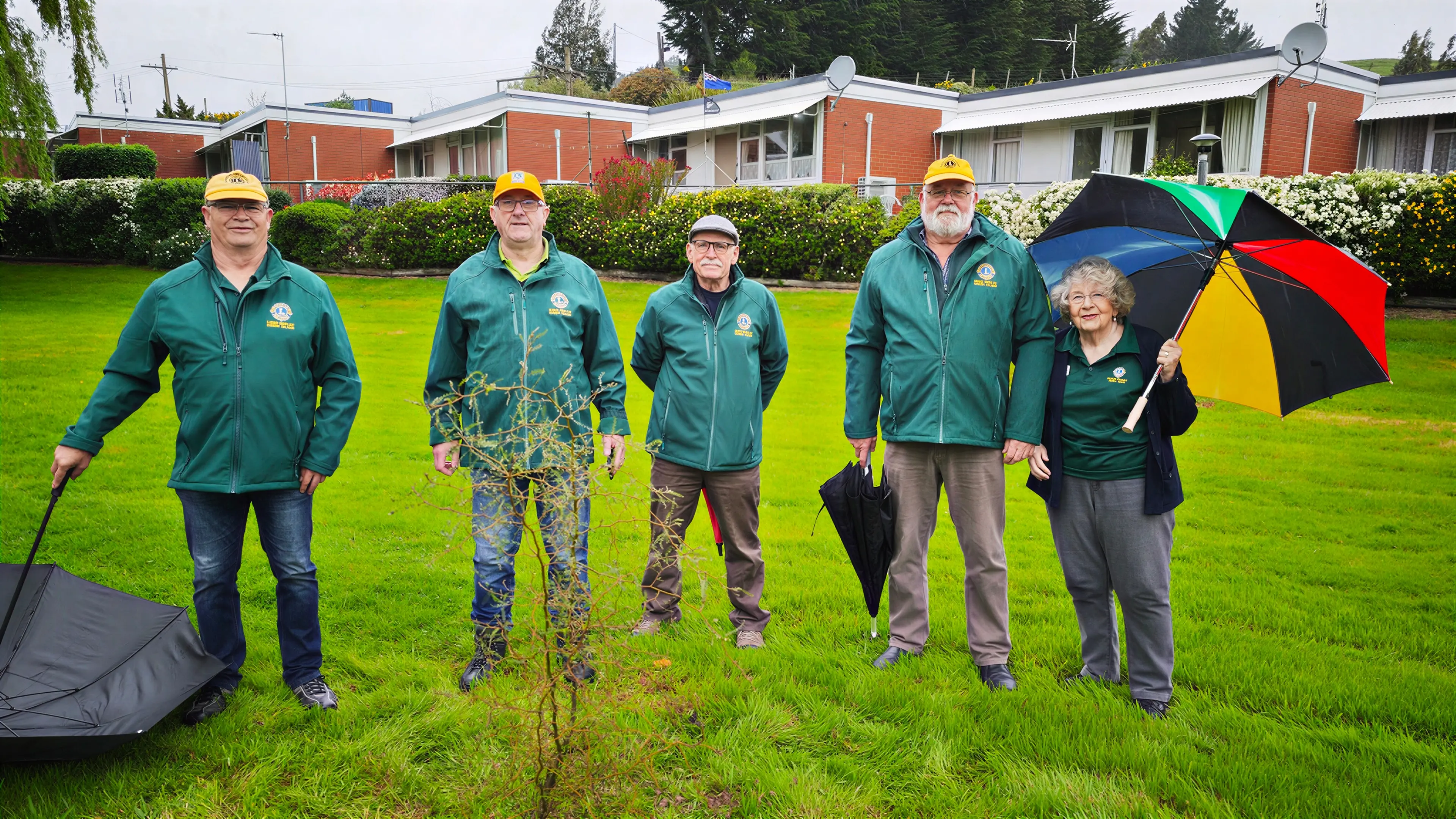 Green Island Lions leaders gather to plant gifted kōwhai in memory of past members