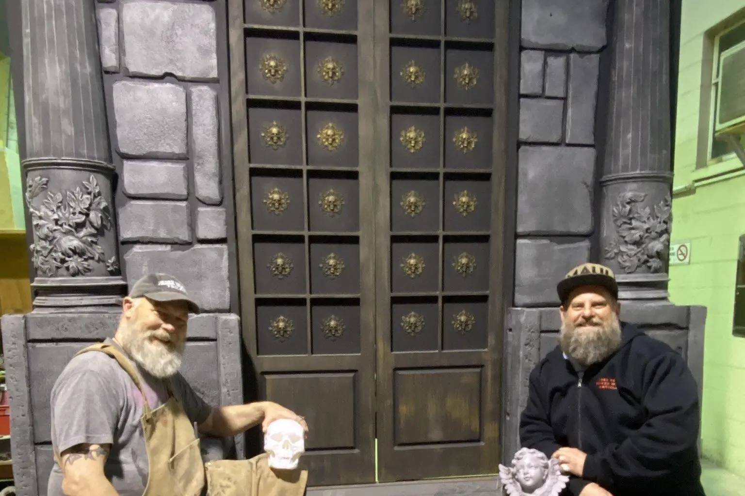 Working on the original sets for Taieri Musical\\'s upcoming production of \\'The Rocky Horror Show\\' has been a months-long volunteer effort for production manager Darrel Read (right), set-building expert Matthew Morgan, and their team. The pair are shown with the ornate entrance to Frank-N-furter\\'s lair. Photo: Brenda Harwood