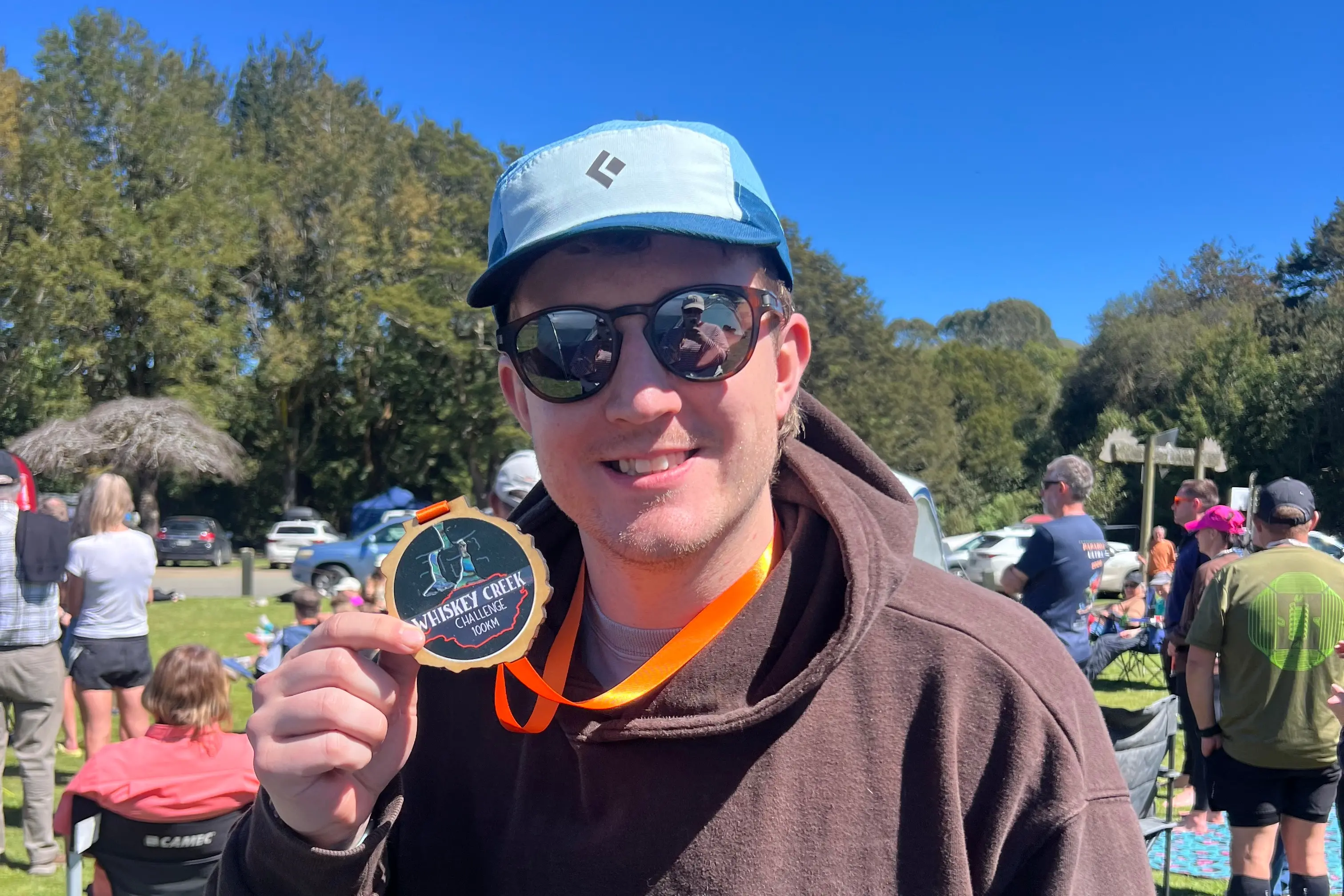 Gore District Mayor Ben Bell claims his medal after a marathon effort in the Whiskey Creek Challenge at the weekend. Photo: Supplied