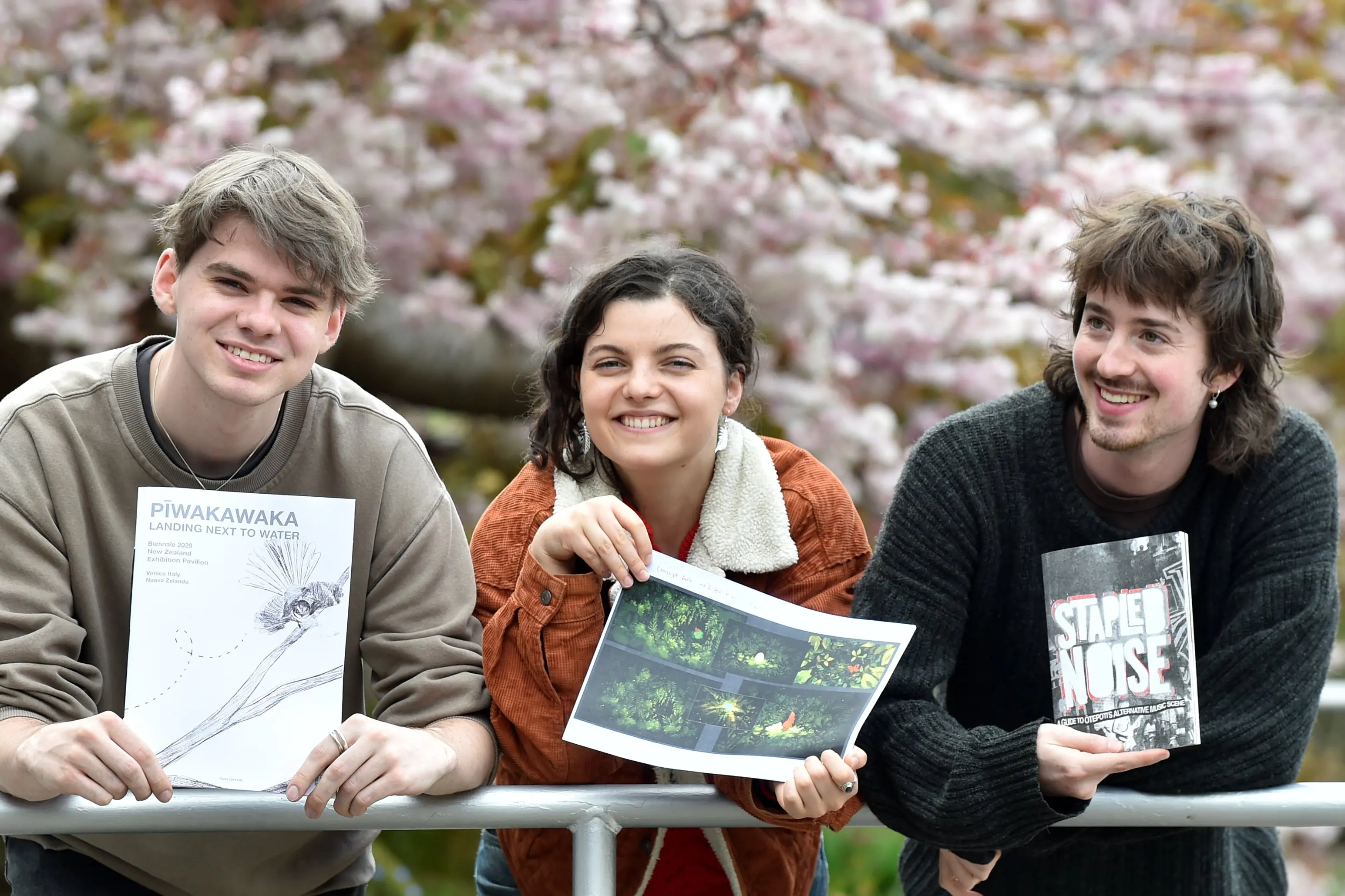 Otago Polytechnic design students (from left) Flynn Connelly, Stella Caulton and Ash McFarlane with their 2026 Designers Institute of New Zealand Best Design Awards\\u00A0gold medal-winning projects. Photo: Peter McIntosh
