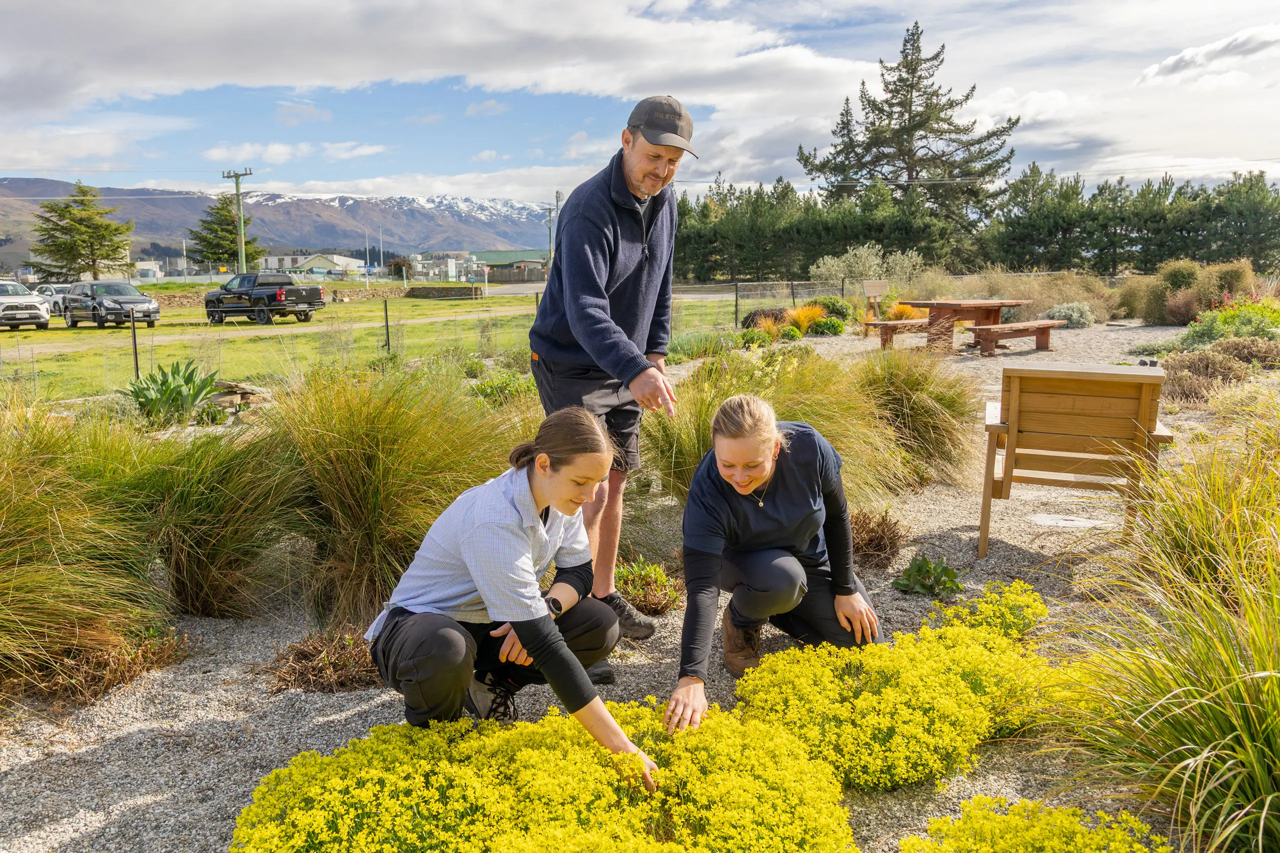 Otago Polytechnic Nursery lecturer Bruce Thurlow (back) instructs horticulture students Paige Julian (left) and Alexandra Lovelock in the polytech\\'s Bannockburn dry garden ahead for the traditional Labour weekend plant sale. Photo: Supplied