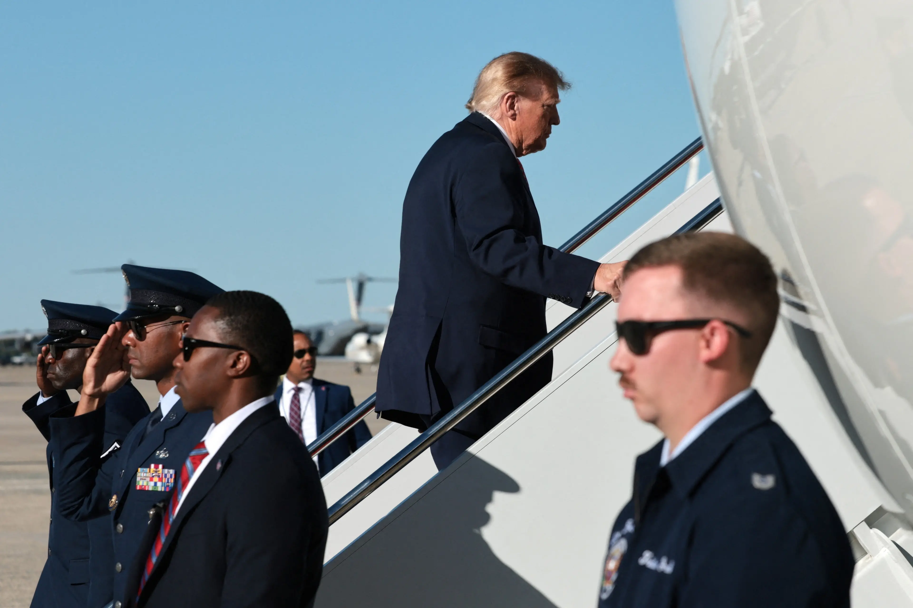 US President Donald Trump boards Air Force One as he prepares to depart Joint Base Andrews, Maryland. Photo: Reuters