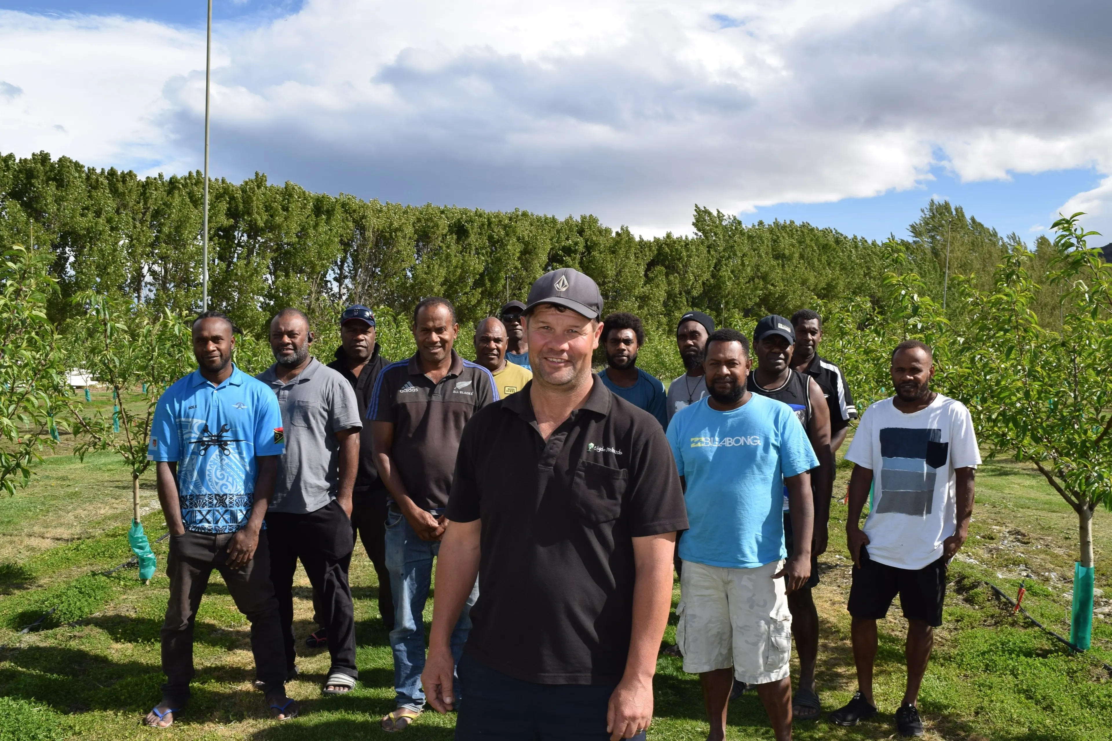 Clyde Orchards operations manager Kris Robb and staff from Vanuatu in 2024. Photo: Shawn McAvinue