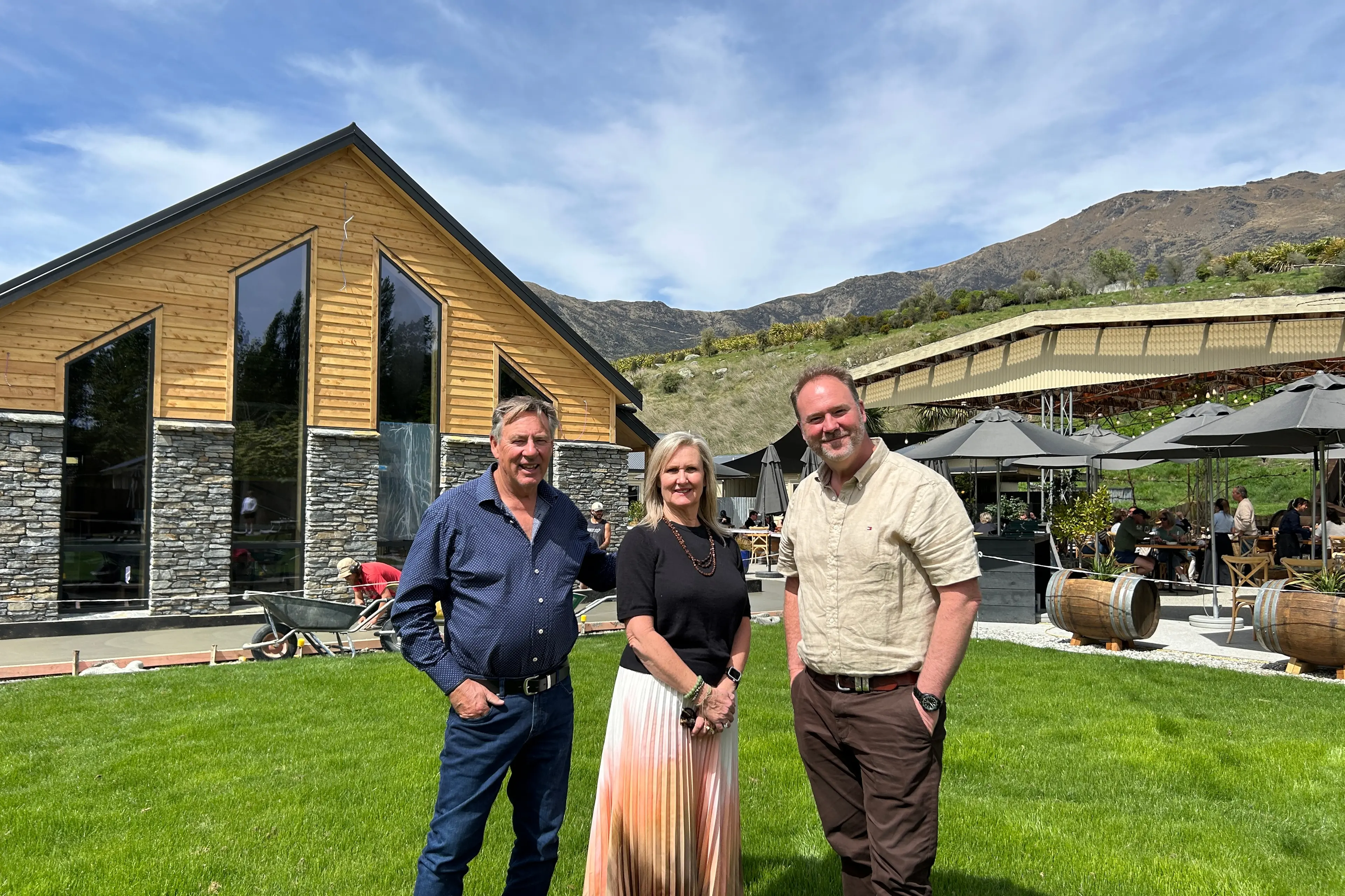 \\u2018Thrilled with expansion\\u2019: In front of The Nevis bistro extension are Kinross owners John and Christine Erkkila and CEO James Thomas. Photo: Supplied