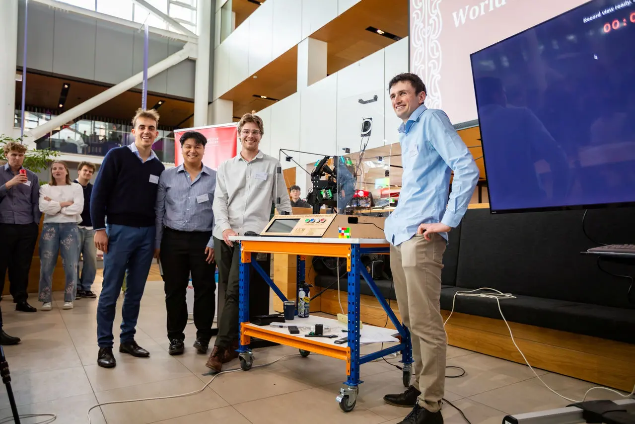 Canterbury University engineering students Maz Cameron, Johann Torres, Caleb Everitt and Hayden Watson have built a robot capable of solving a 4x4 Rubik\\'s Cube in under 10 seconds. Photo: Supplied