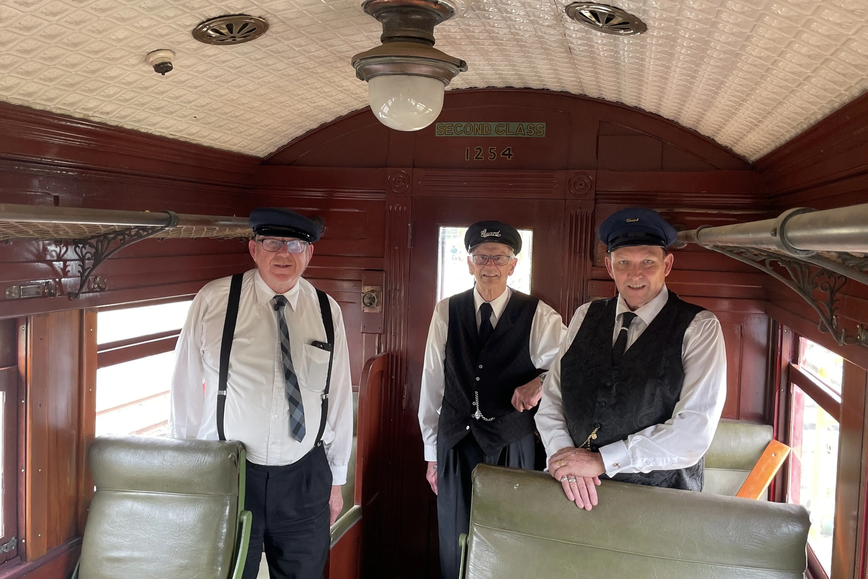 Organisers of this weekend\\'s Ocean Beach Railway 65th anniversary celebrations are planning to include this historic railway passenger carriage in the event, which was pictured shortly after its restoration was complete with (from left) secretary/treasurer David Thomson, Lyall Kelpe, and chairman Campbell Thomson. Absent: Kevin Philips. Photo: Supplied