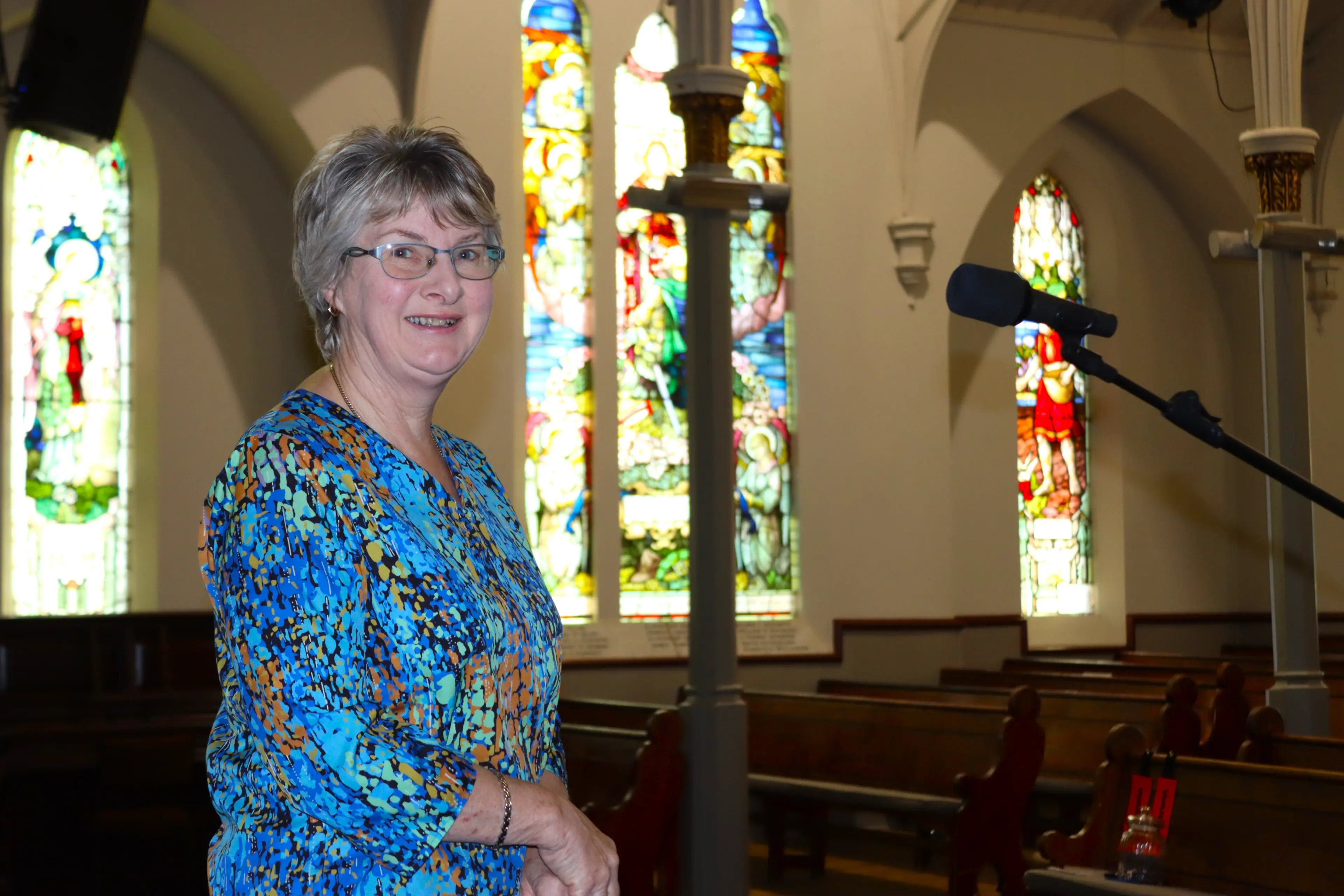 East Taieri Presbyterian Church fundraising committee member Chris Jones says the parish hopes to clean and restore stained glass windows in the historic building. Photo: Sam Henderson