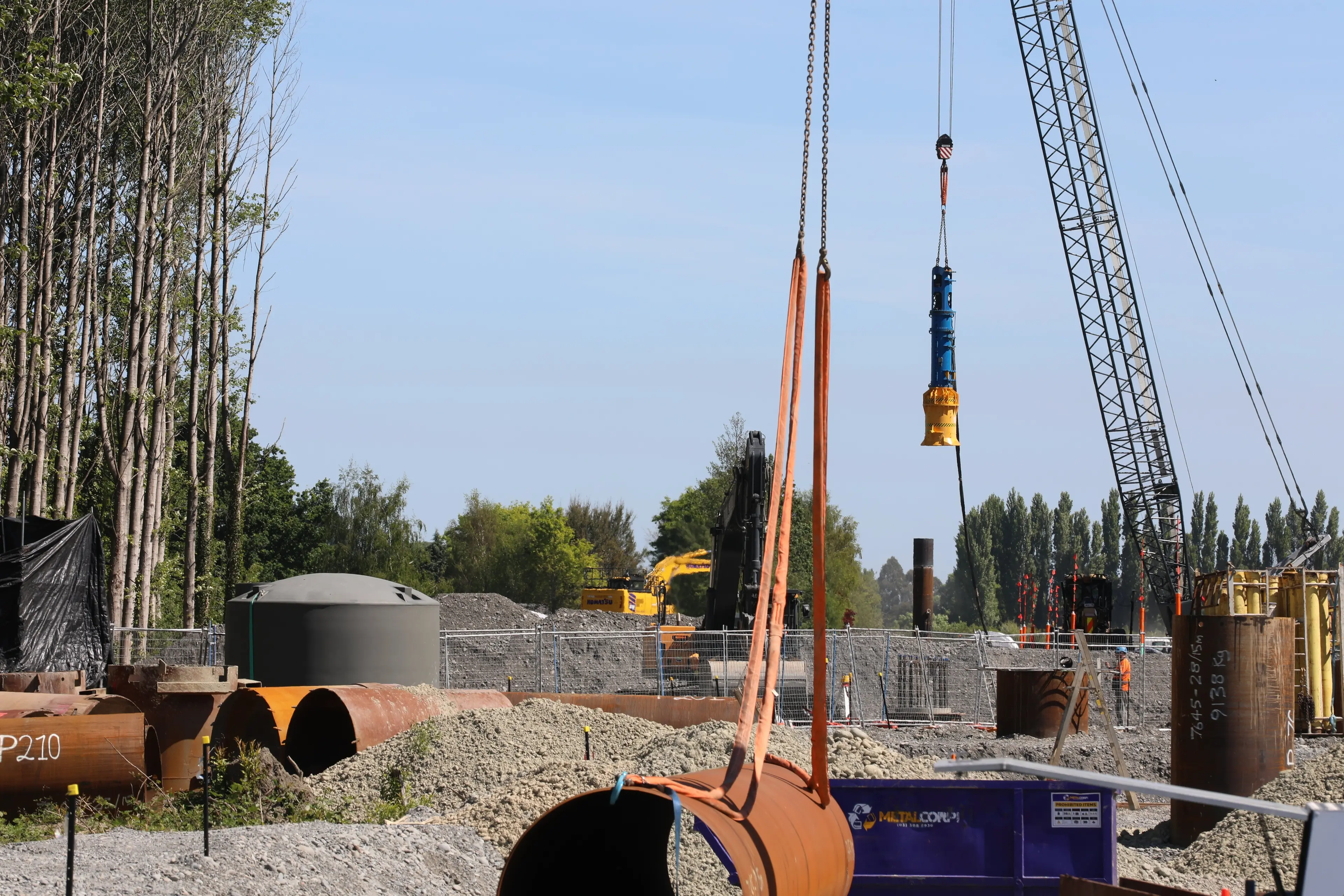 A crane is used to pound the piles into the riverbed Photo: Heather Mackenzie