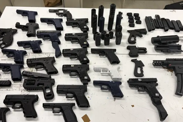 Police located a significant number of 3D-printed guns and parts. Photo: Police