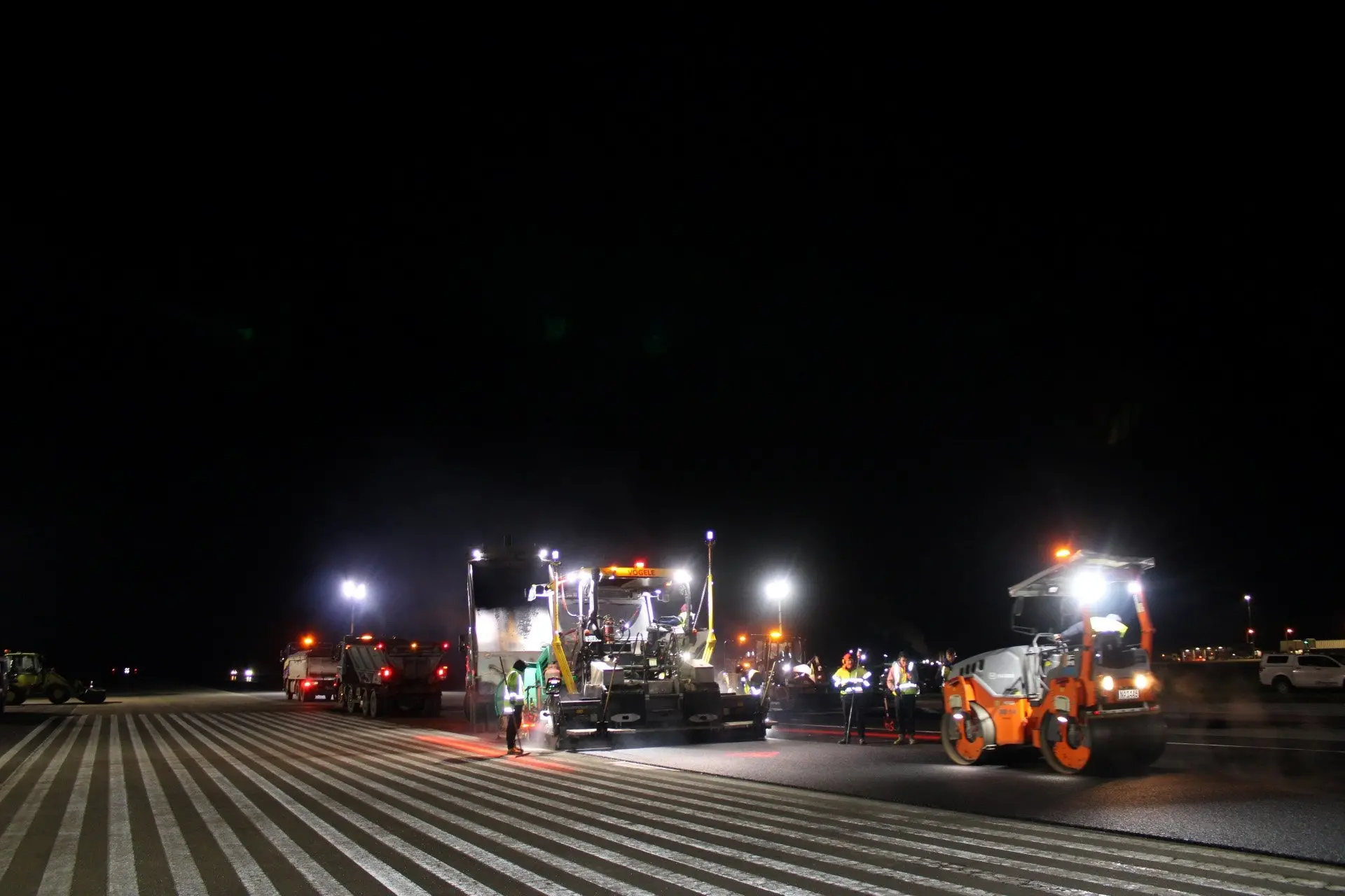 Workers carry out project work to reseal the Dunedin Airport runway last winter. Photo: supplied