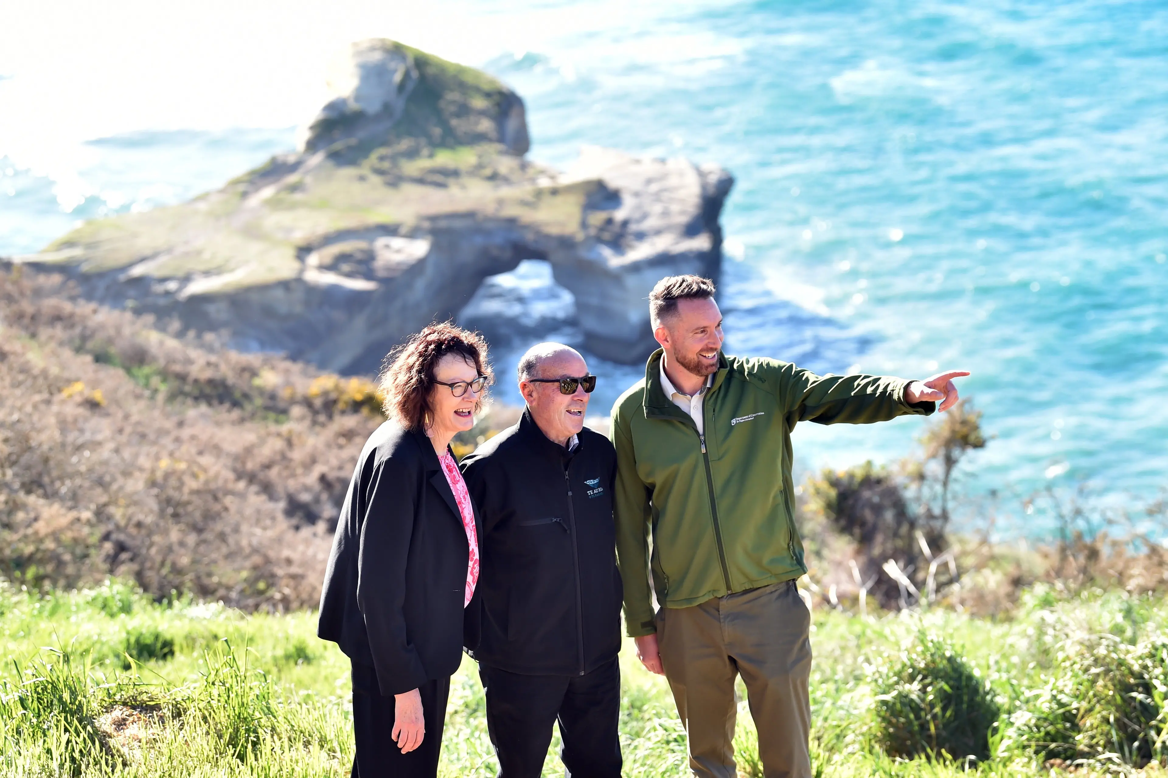 Enjoying the sights of the new Tunnel Beach track on Wednesday are (from left): Dunedin deputy mayor Cherry Lucas, Te R\\u016Bnanga o \\u014Ct\\u0101kou leader Edward Ellison and Department of Conservation coastal Otago operations manager Gabe Davies. Photo: Peter McIntosh