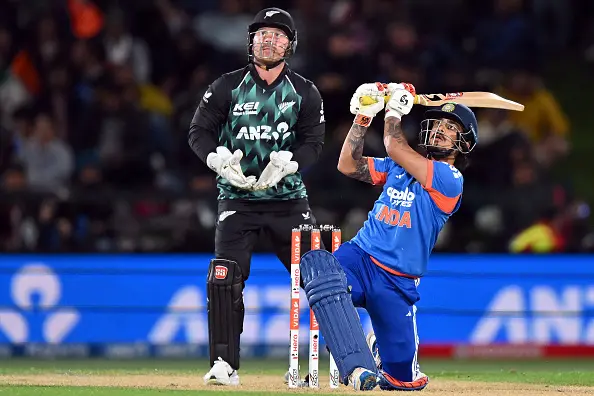 India\\'s Ishan Kishan launches a shot while batting against New Zealand. Photo: Getty