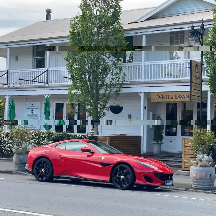Luxury car dealer rumoured to be overseas as business shuts abruptly