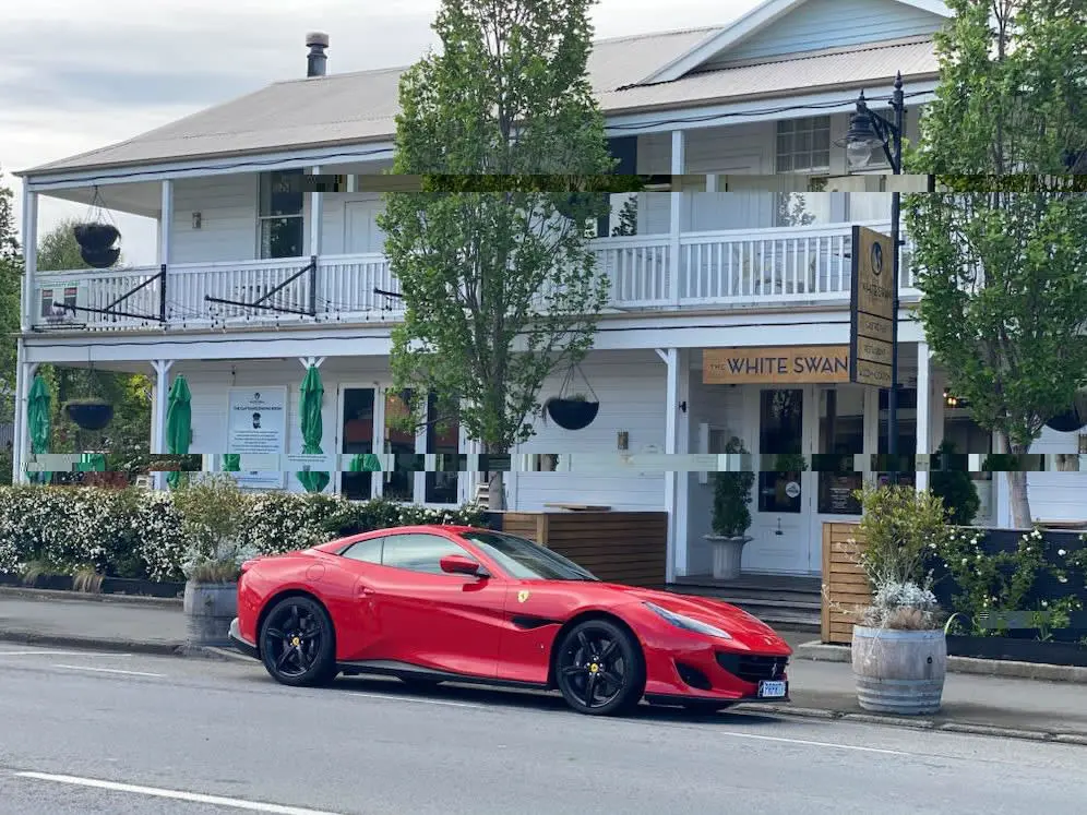 Luxury car dealer rumoured to be overseas as business shuts abruptly