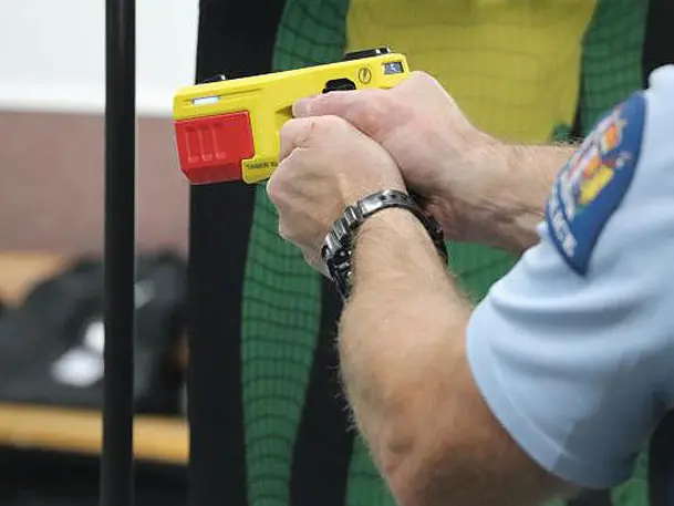 'Come at me then': Taser fails to bring down man brandishing knife at police