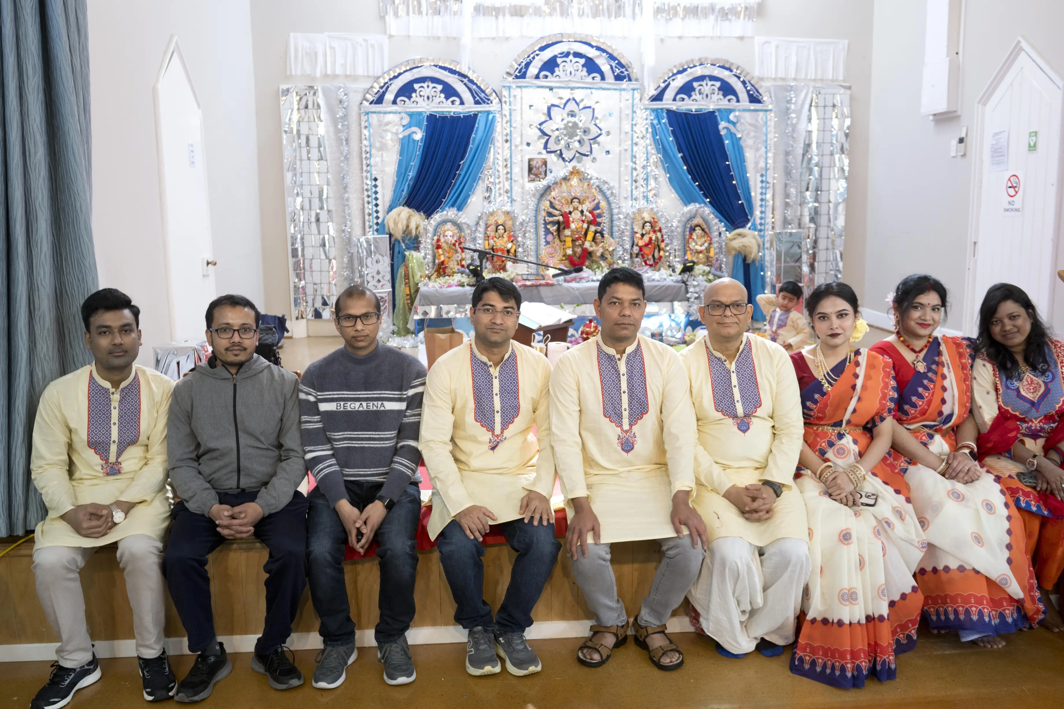 Members of Bangladeshi community organisation Shonkho (from left) Newton Saha, Prodep Barak, Amit Sarker, Shuva Bhowmik, Goutam Mitra, Prof Shyamal Das, Nandita Paul, Meera Kabiraz and Adrita Das celebrate Durga Puja. Photo: Gerard O\\'Brien