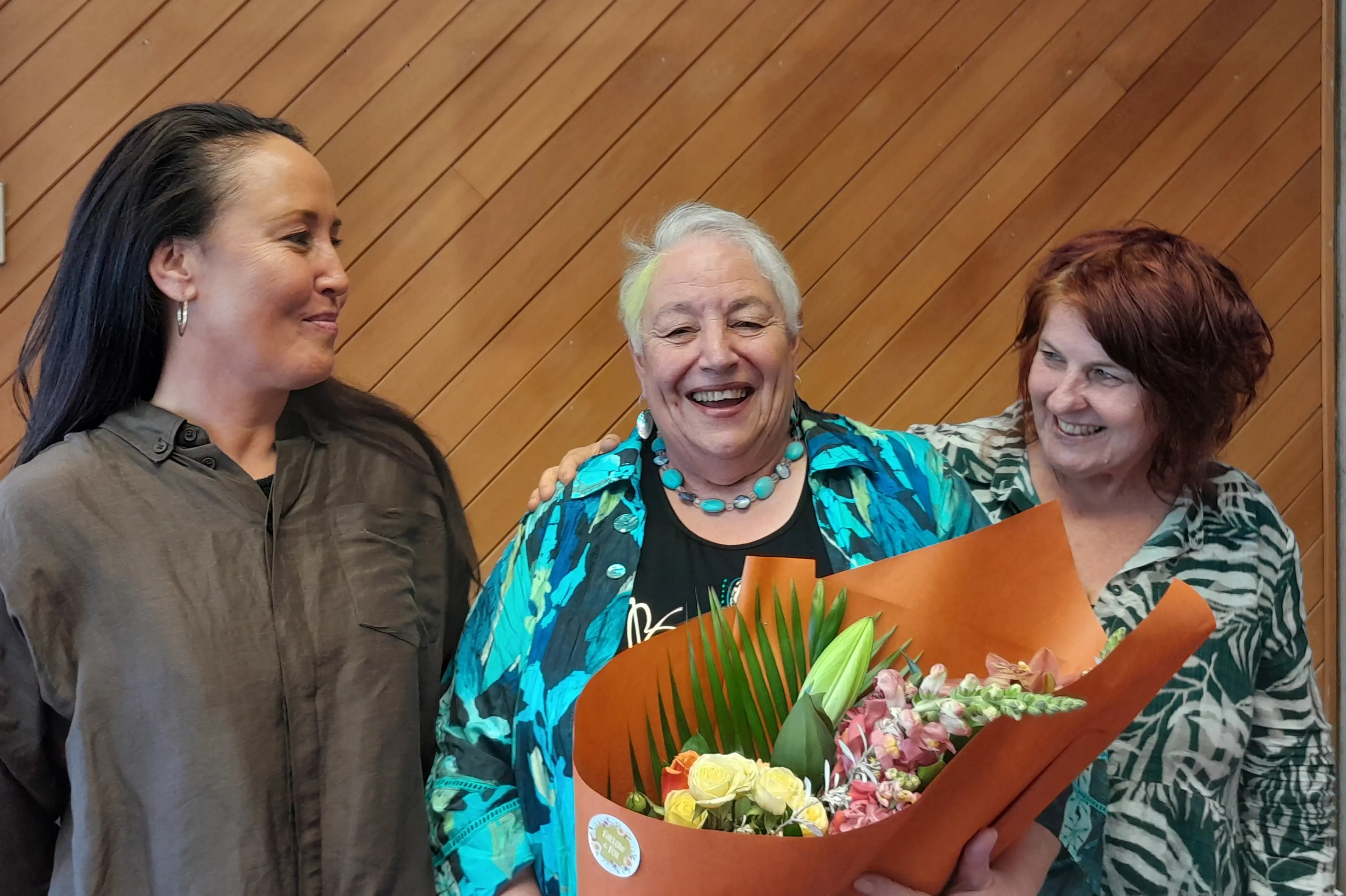 Co-founder of the service which became \\u014Ctepoti Dunedin Wh\\u0101nau Refuge Suzanne Menzies-Culling (centre) with board chairwoman Zoe Bristowe (left) and general manager Simone Claire at commemorations marking 50 years of service. Photo: Ruby Shaw