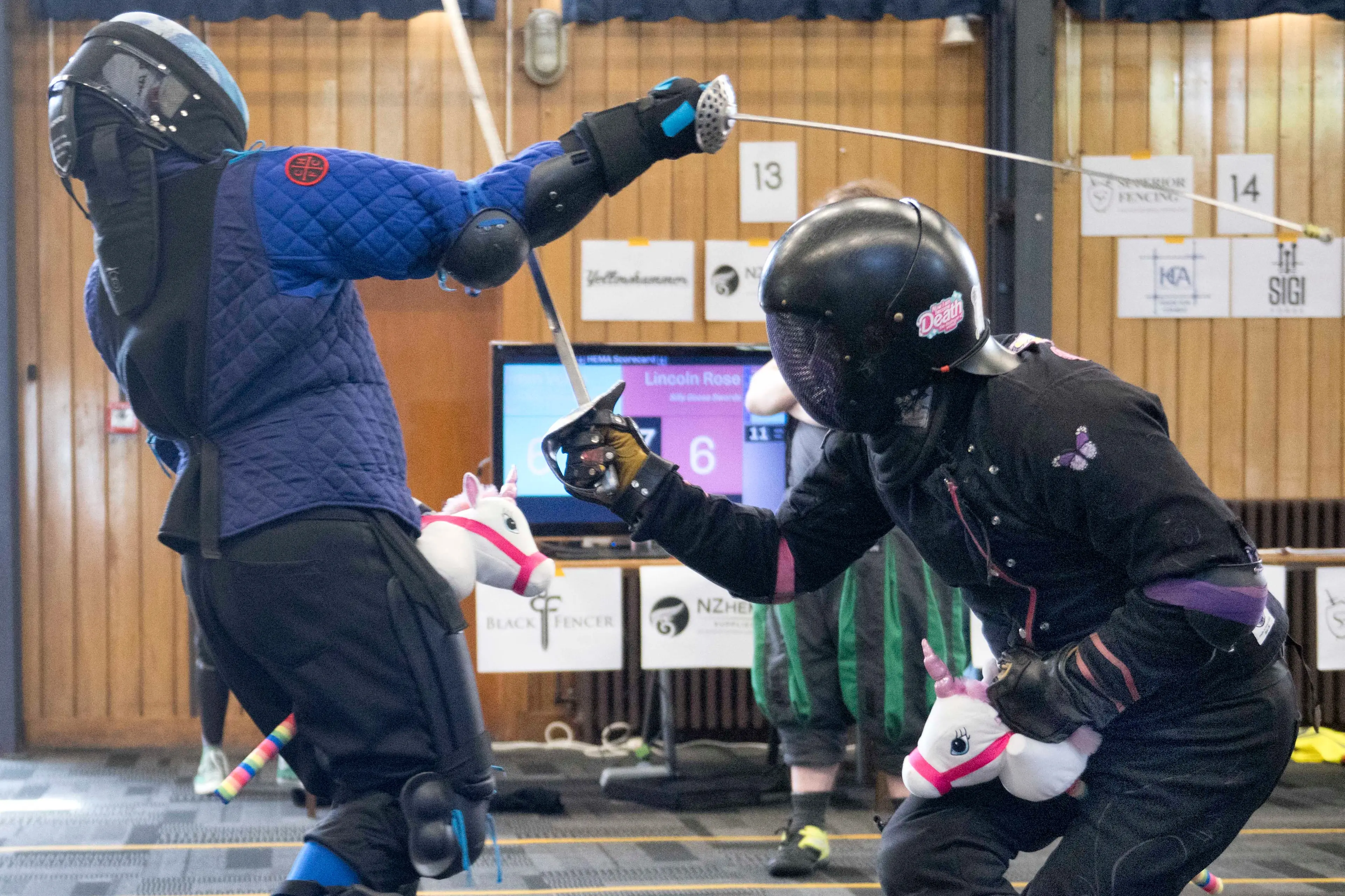 Jim Voice (left), of Canterbury, and Lincoln Rose, of Wellington, clash swords during a \"cavalry charge\" bout of the South Island Skirmish, held at Dunedin North Intermediate on Sunday. Photo: Gerard O\\'Brien