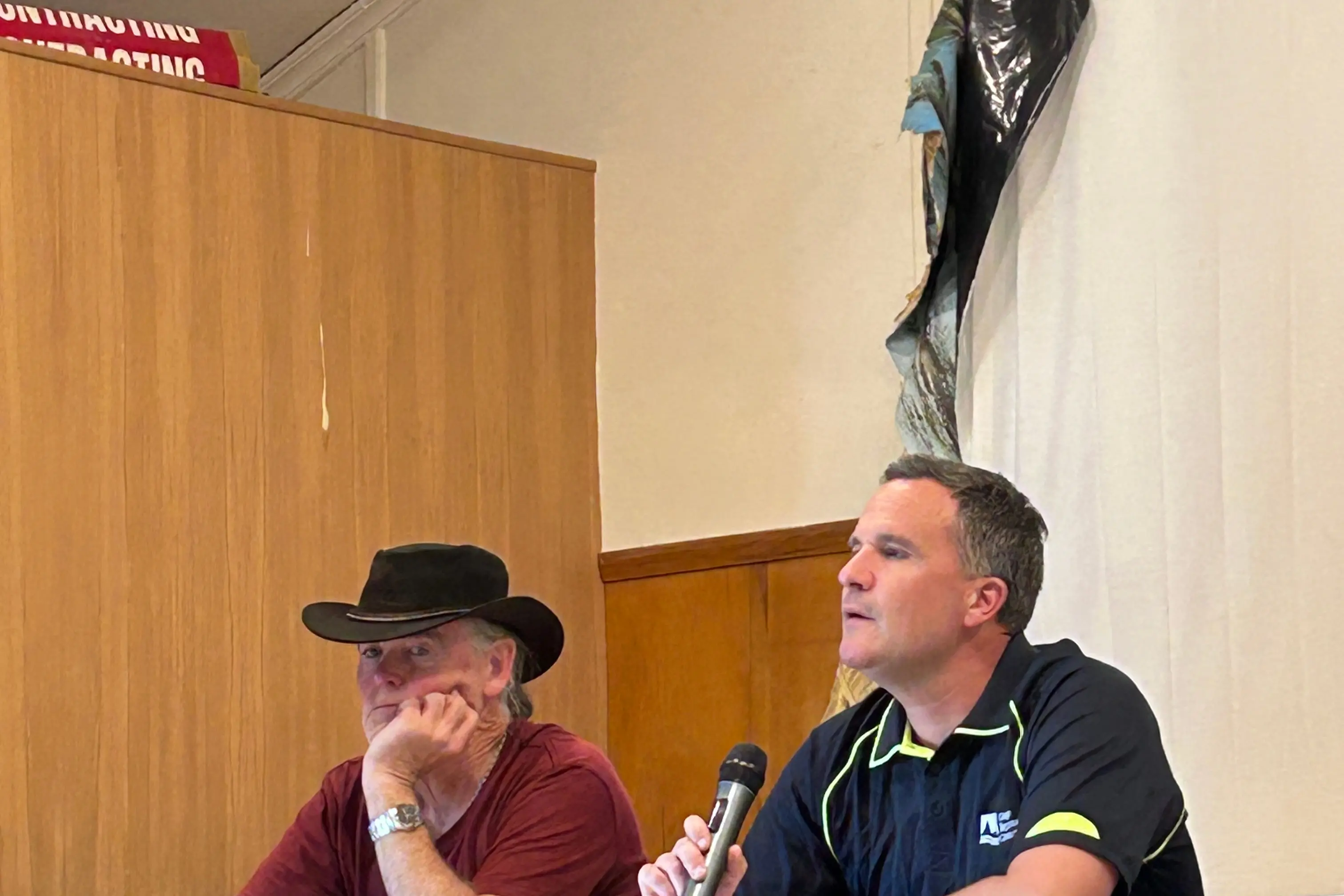 Otago Regional Council chief executive Richard Saunders (right) answers questions at a meeting on Sunday to discuss the council\\'s decision to issue a non-notified consent to spread sewage waste from Wanaka on Lauder farmland. Photo: Julie Asher
