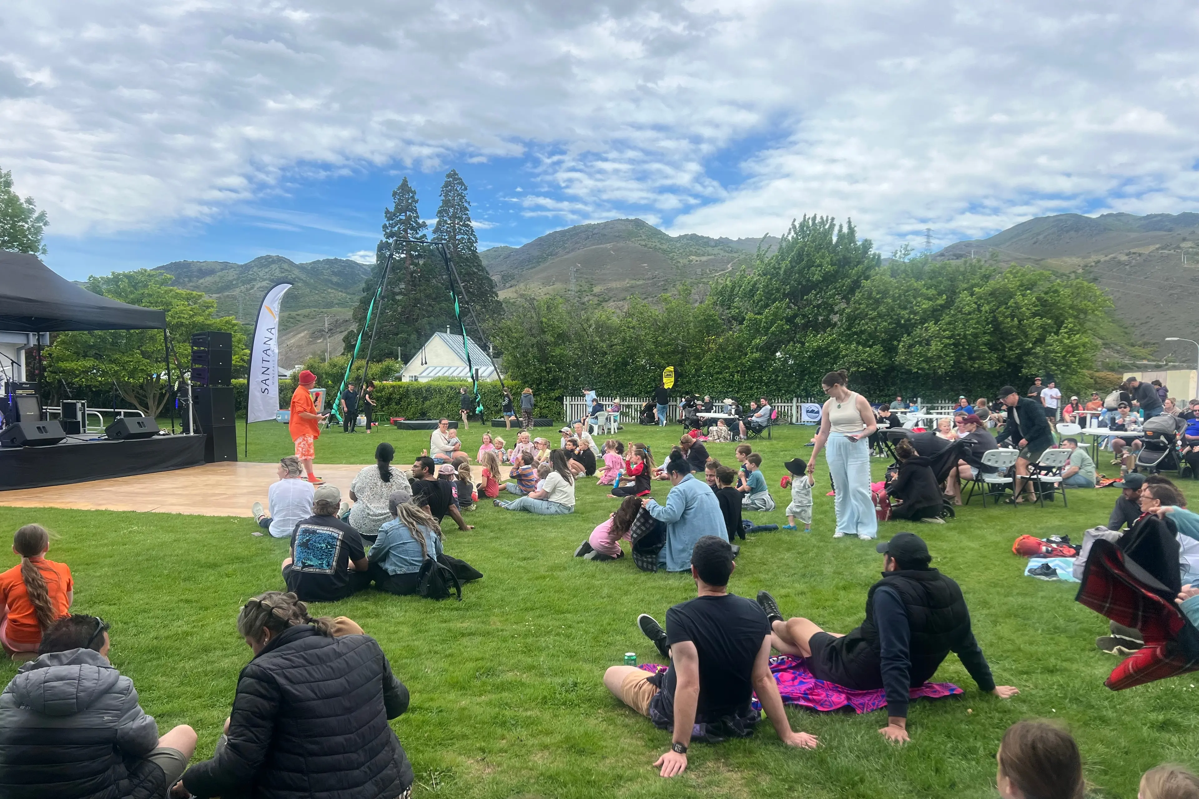 Crowds enjoy the afternoon with a magic show at the Cromwell Street Party and Fireworks at the Old Cromwell Heritage Precinct. Photo: Carys Trotter
