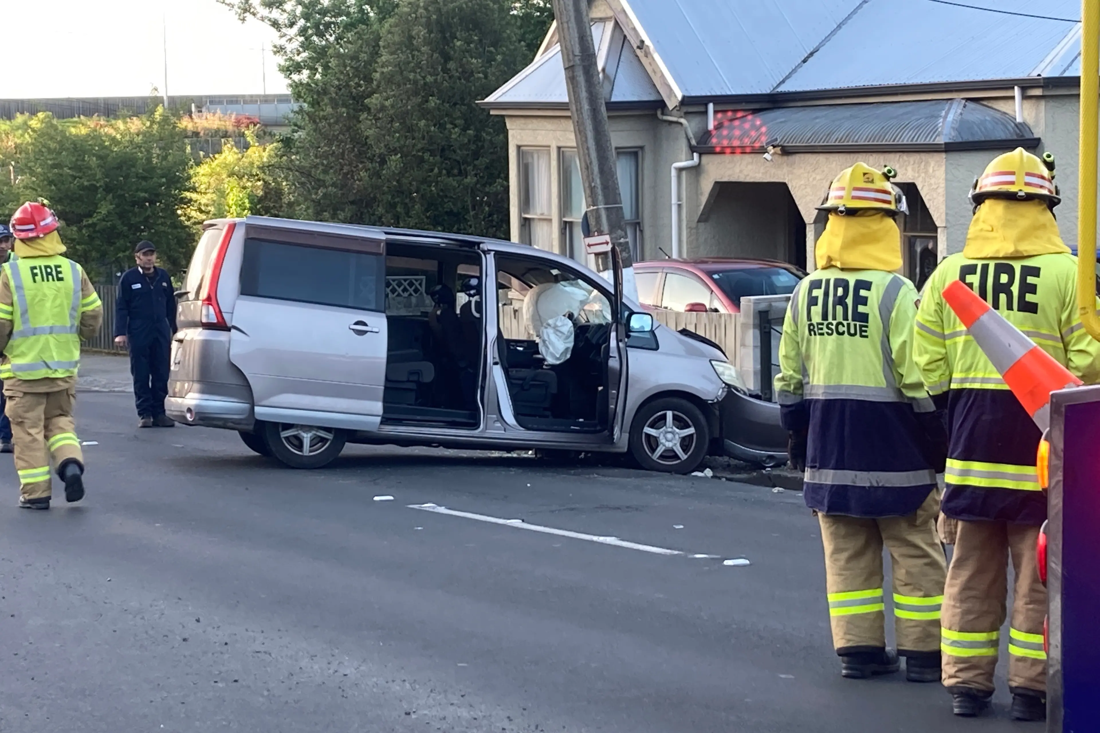 <p>Emergency services at the scene after a van collided with a power pole in Glen Rd this morning. Photo: Stephen Jaquiery </p>\\n