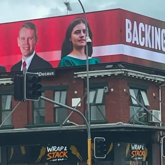 Greens lodge complaint over ‘backing the gangs’ billboard