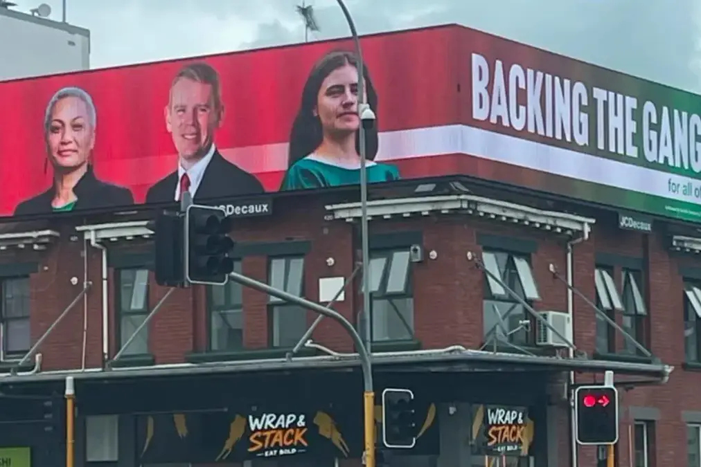 The billboard ads feature Green co-leaders Marama Davidson (left), Chl\\u00F6e Swarbrick and Labour leader Chris Hipkins. Photo: RNZ/Supplied