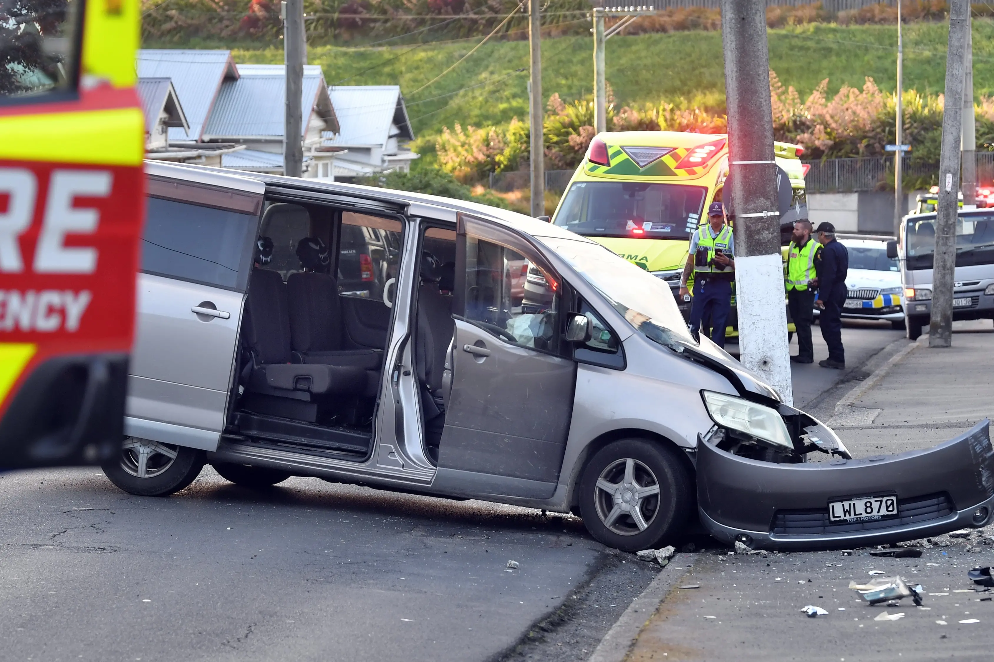Two injured after van hits power pole in Glen Rd
