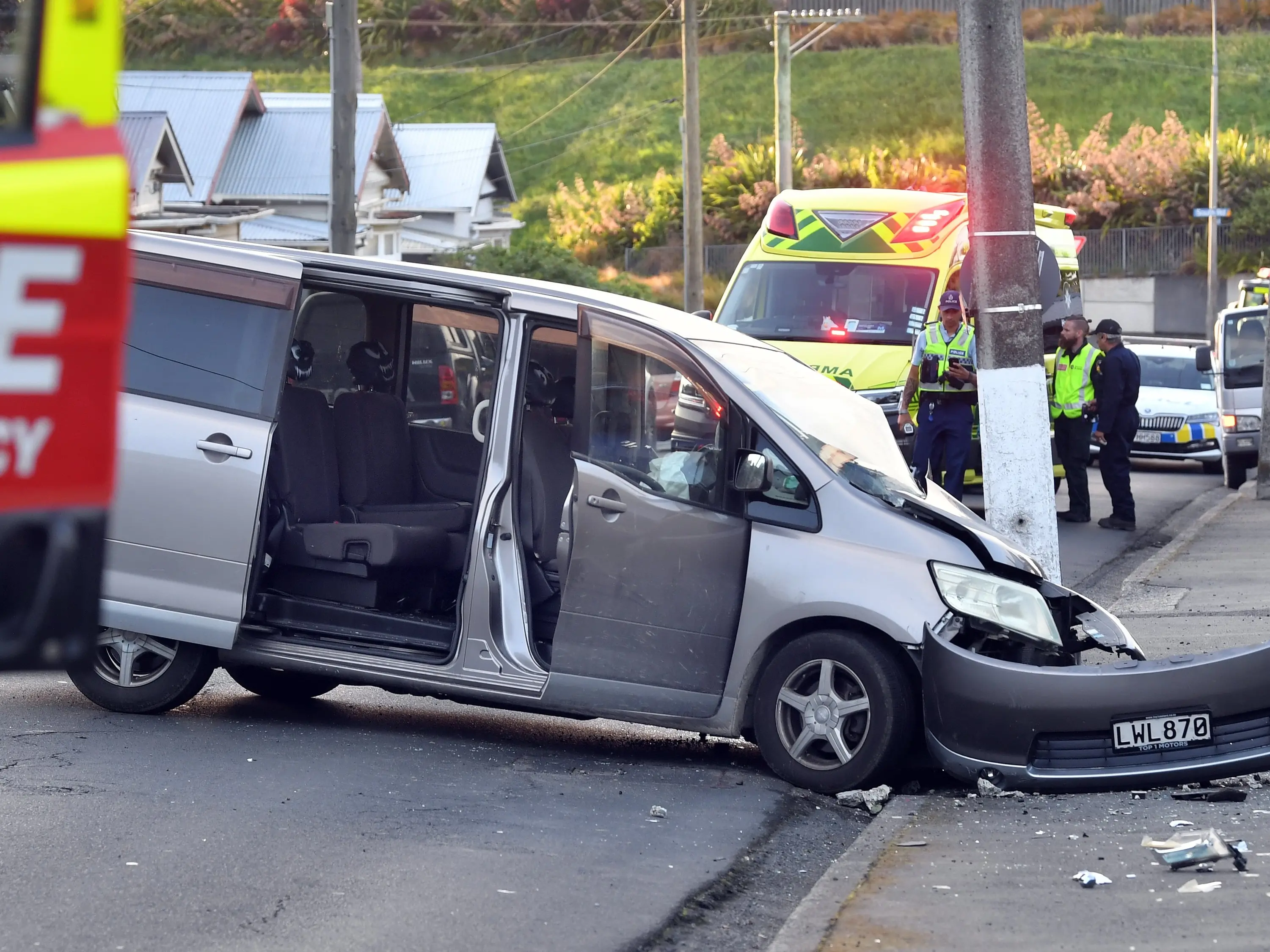 Two injured after van hits power pole in Glen Rd