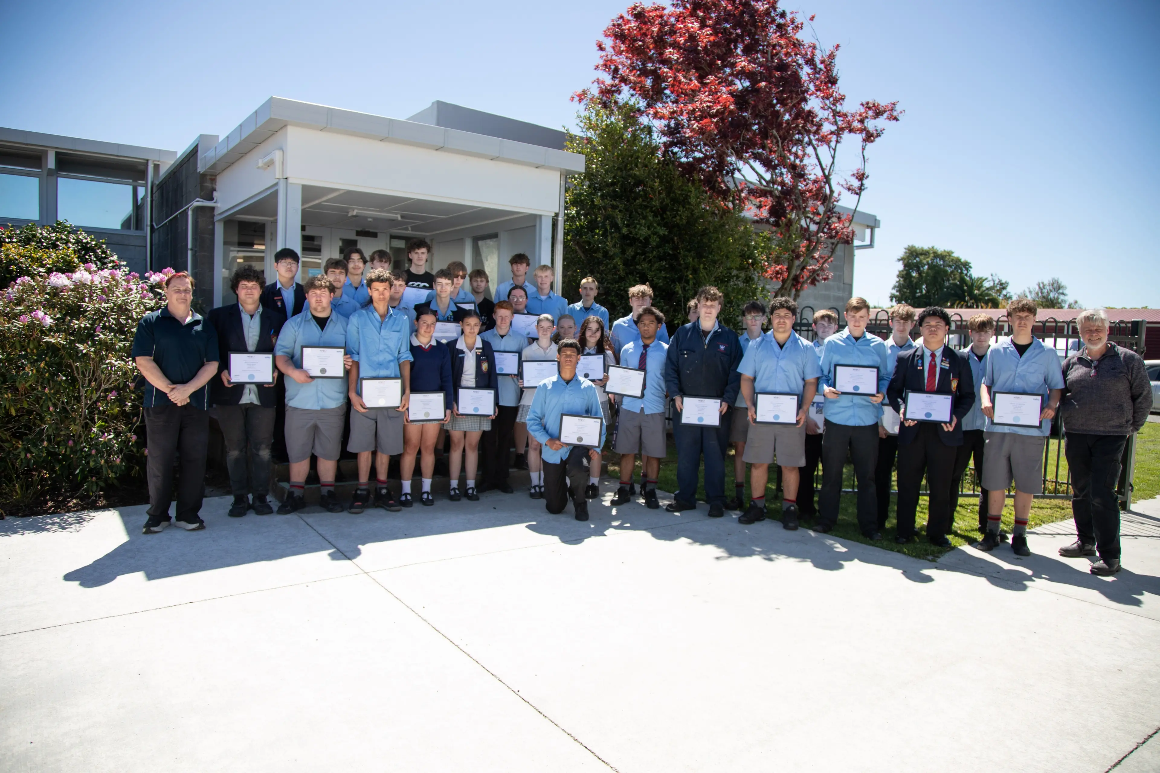 Year 12 and Year 13 students were presented with their NZQCF Micro-credentials certificates last week. Technology teacher Patrick Neal far right, said he appreciated their hard work and dedication throughout the year. Photo: Heather Mackenzie