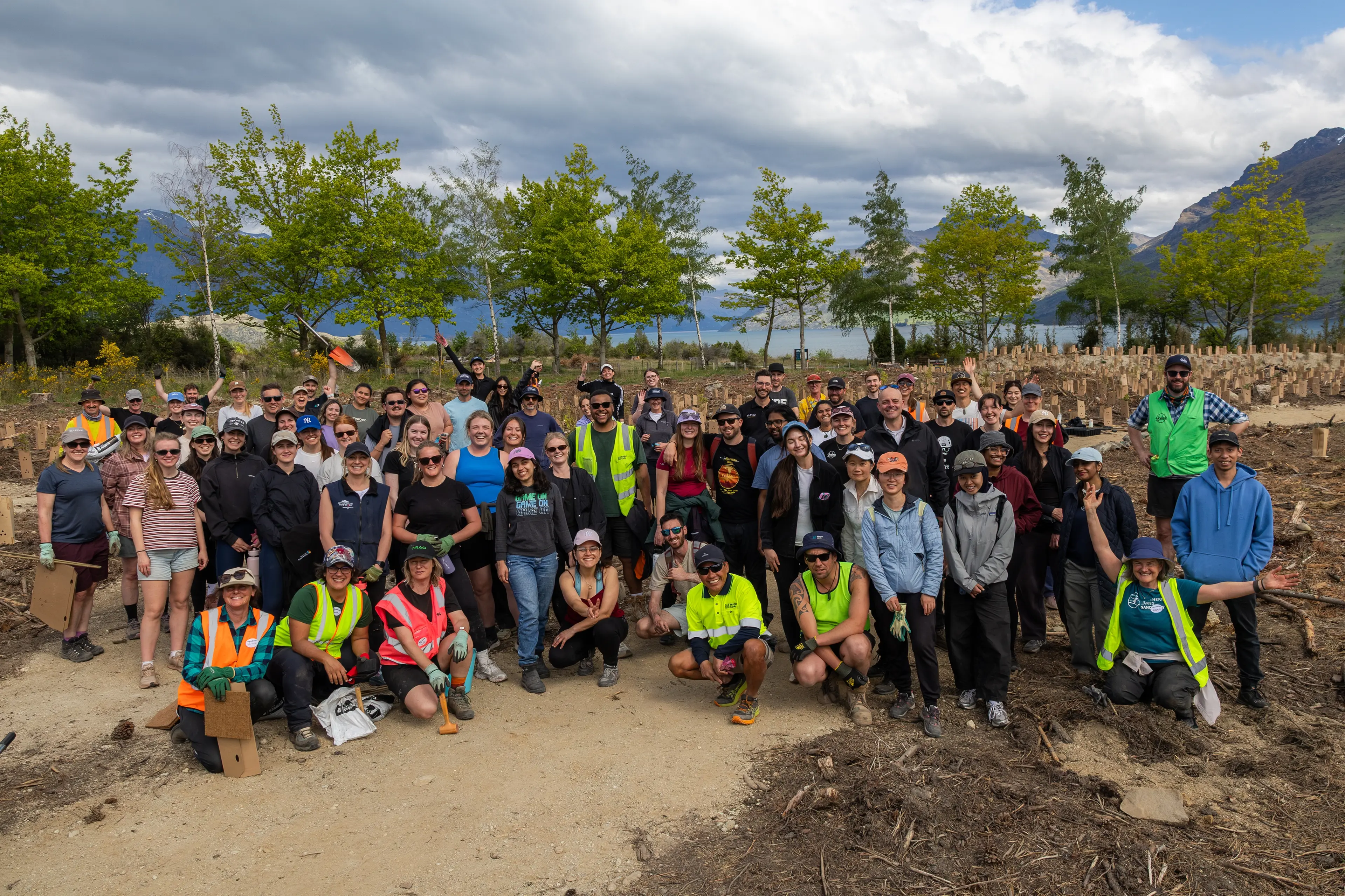 Digging in: Some of the 150 volunteers involved in last week\\'s Love Queenstown Industry Planting Day at Kelvin Heights\\' Jardine Park. Photo: Will Nelson