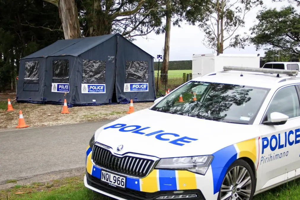 Police at the scene of the alleged murder on Burnham School Rd in January. Photo: RNZ/Nathan McKinnon